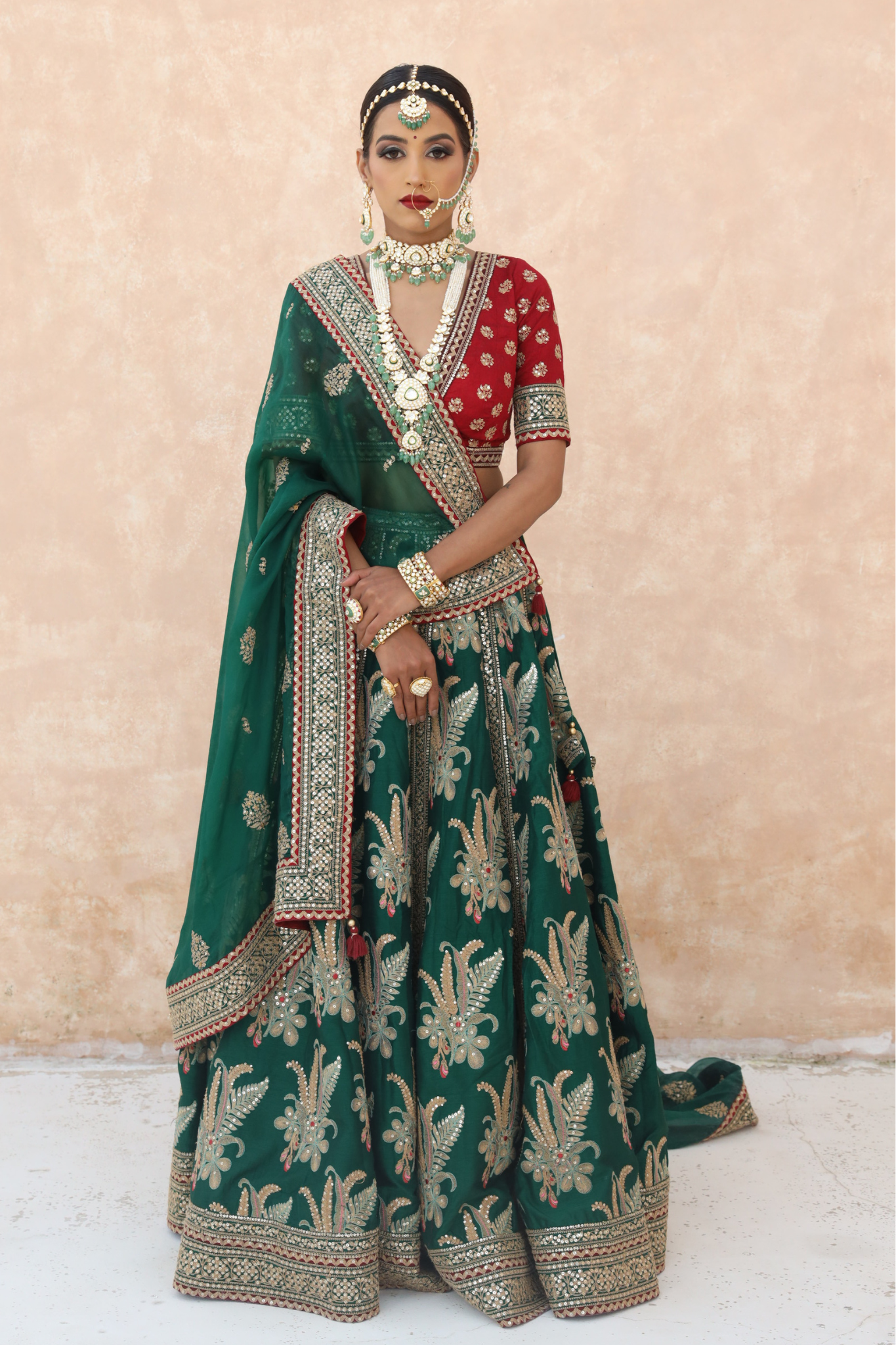 Raw Silk Lehenga Embellished with Gota Patti and Thread work