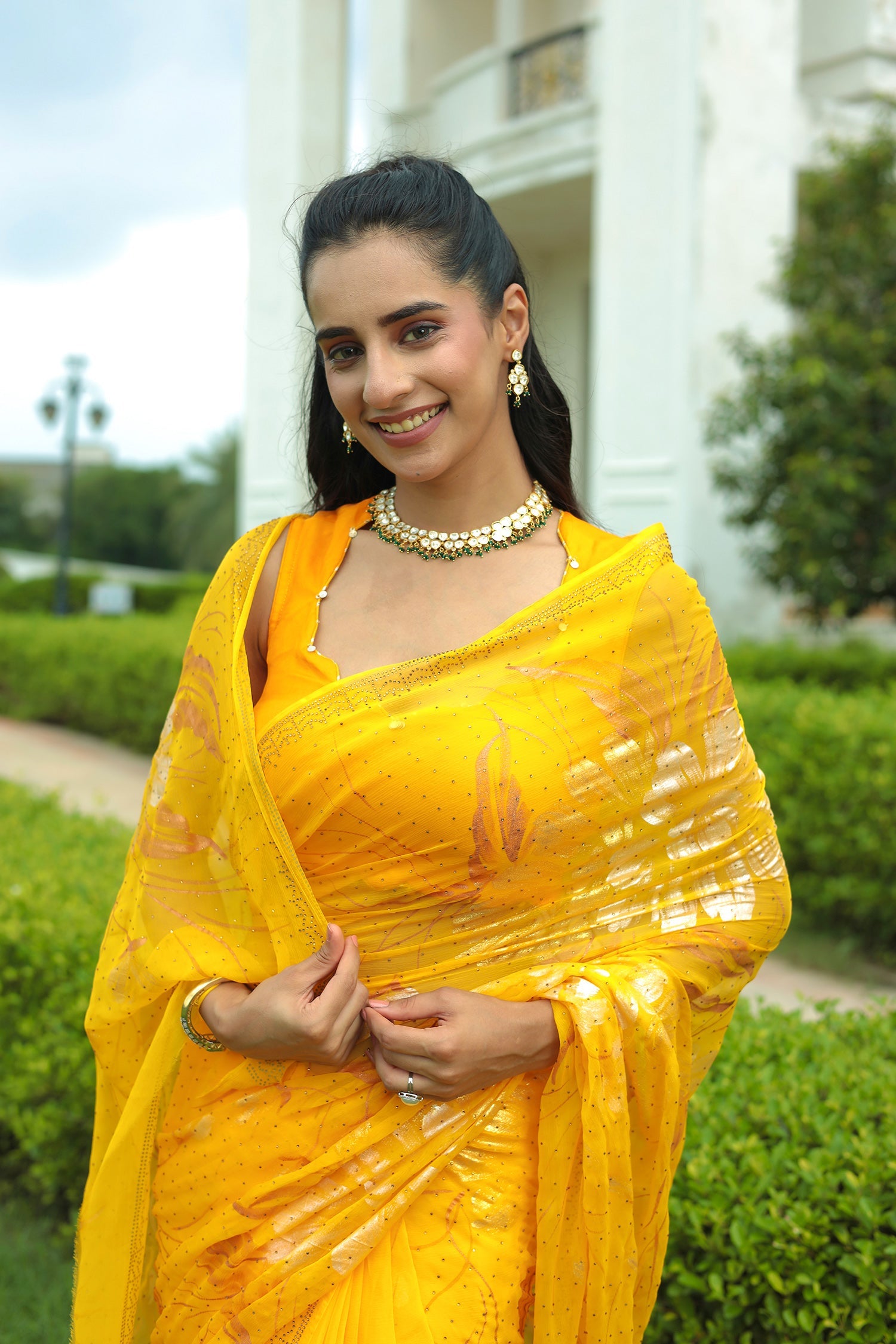 Yellow Chiffon Saree Adorned with Swarovski and Foil print