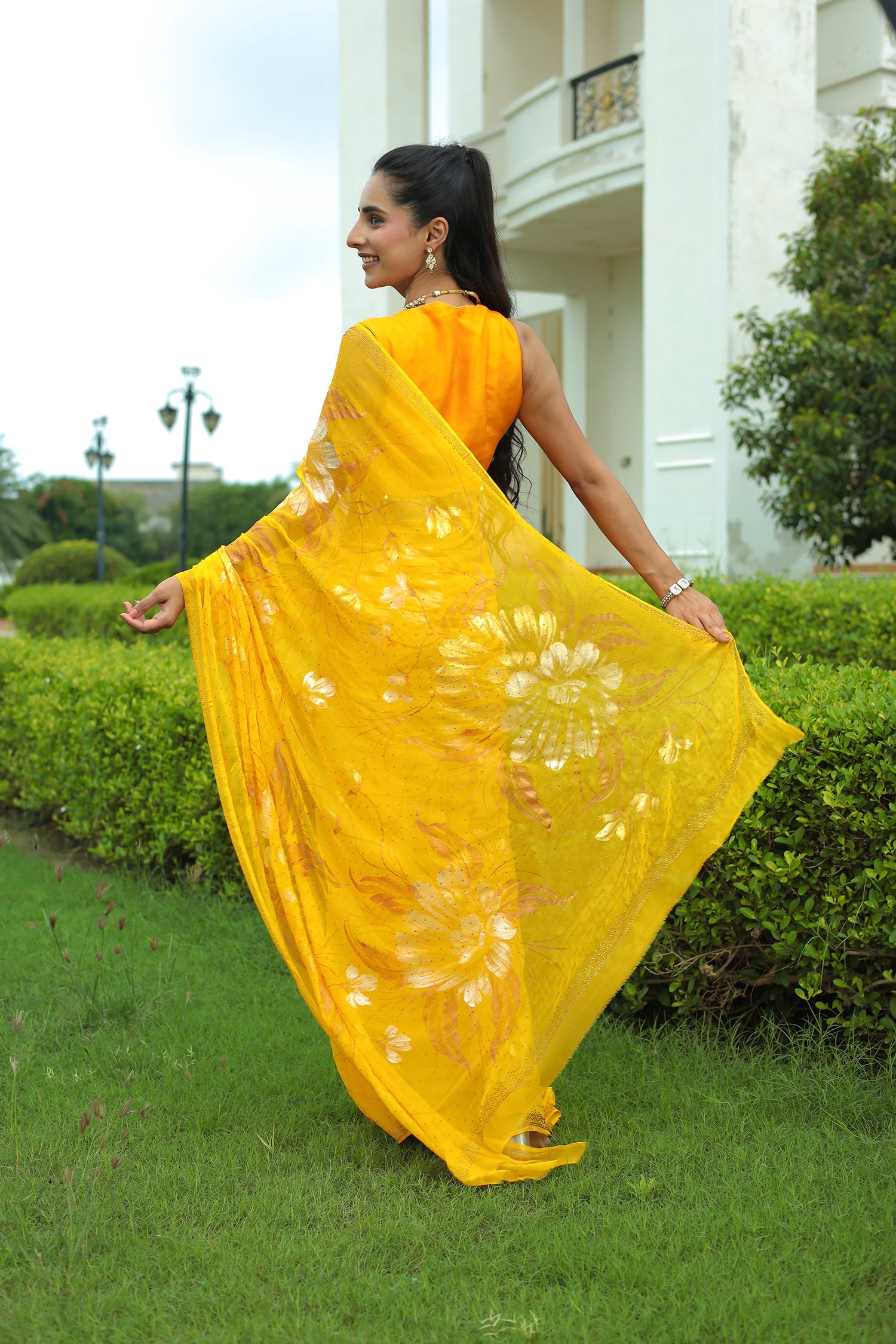 Yellow Chiffon Saree Adorned with Swarovski and Foil print