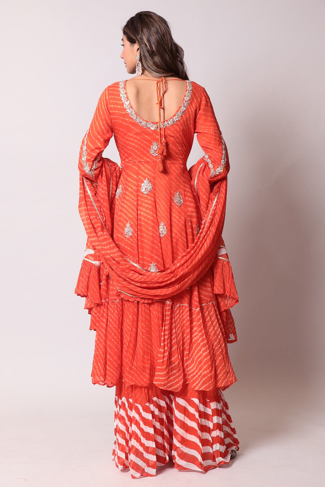Leheriya Georgette Straight Cut Suit with Gota Patti and Mothra work.