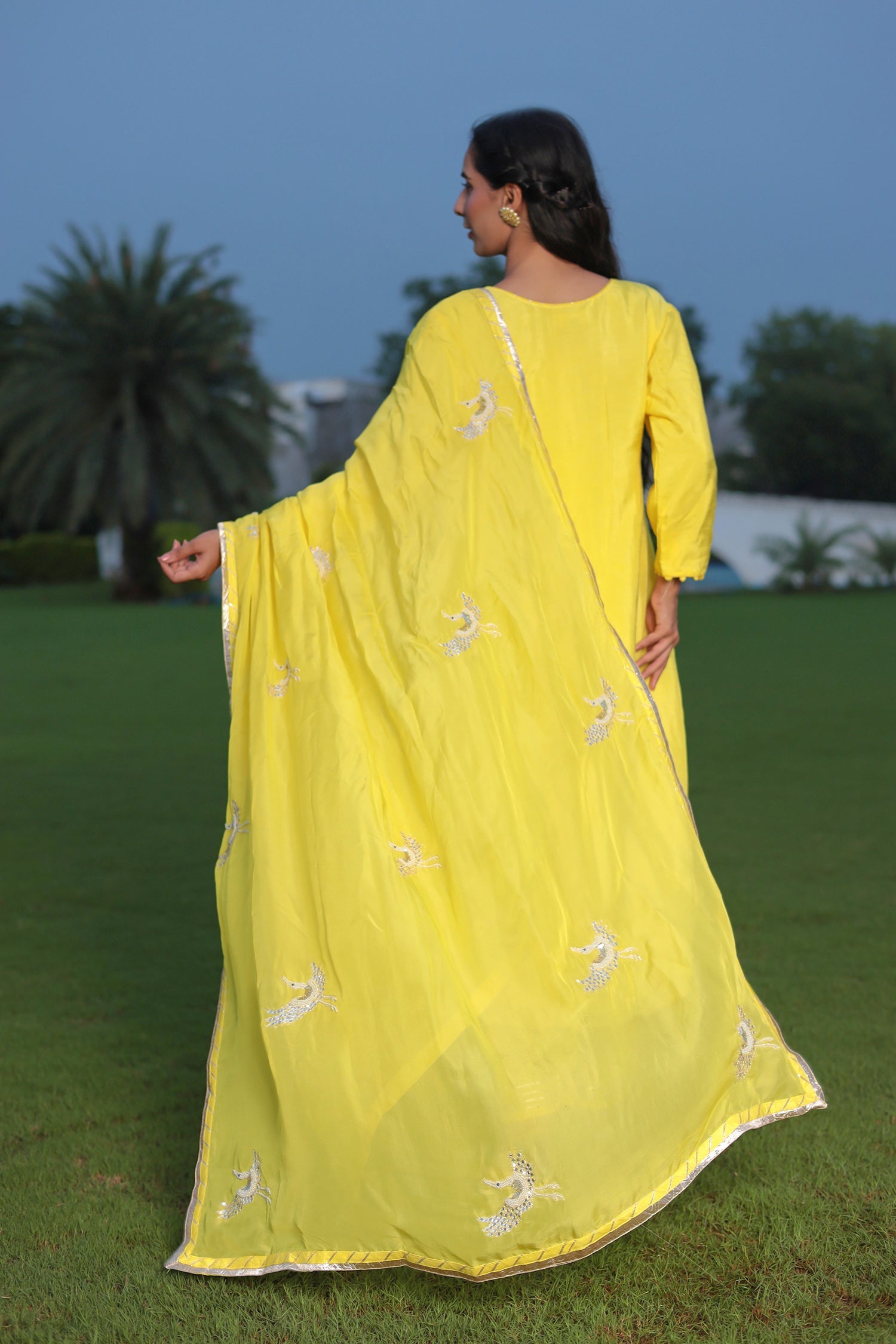 Festive Silk Suit Enhanced with Aari, Gota, Pearl & Sequins Embellishment