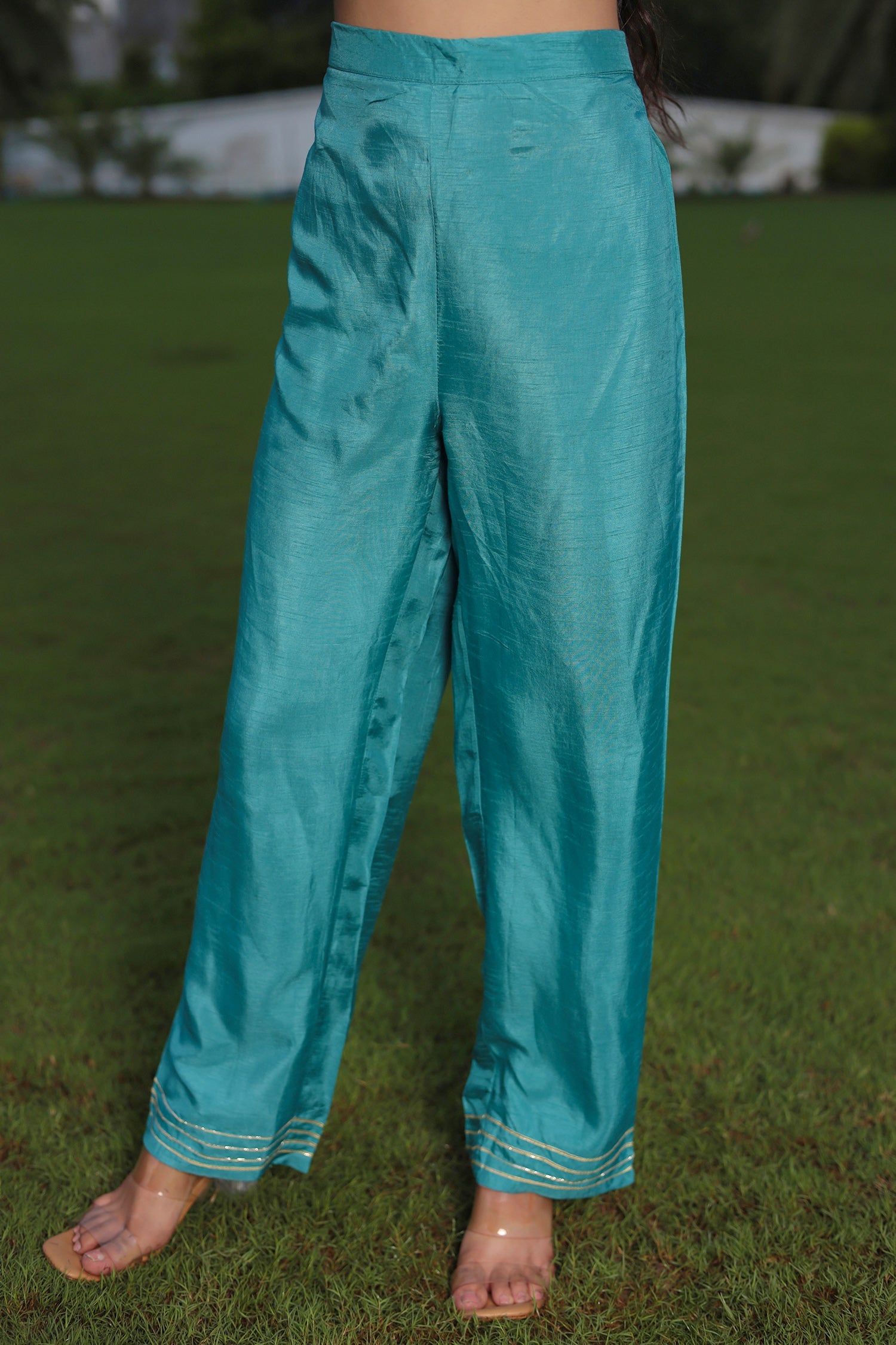 Festive Silk Suit Enhanced with Aari, Gota, Pearl & Sequins Embellishment