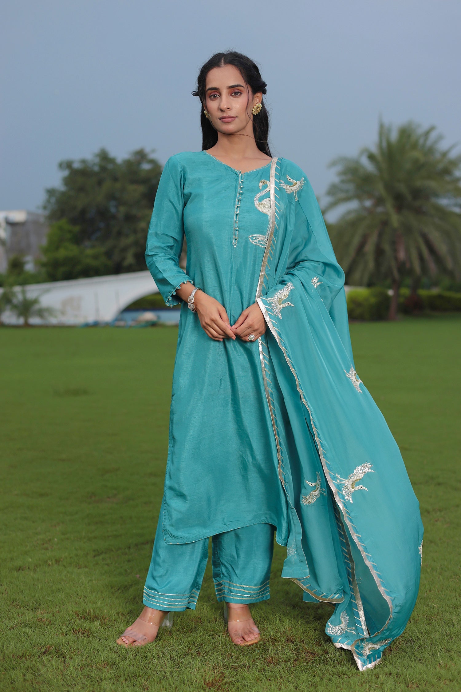 Festive Silk Suit Enhanced with Aari, Gota, Pearl & Sequins Embellishment