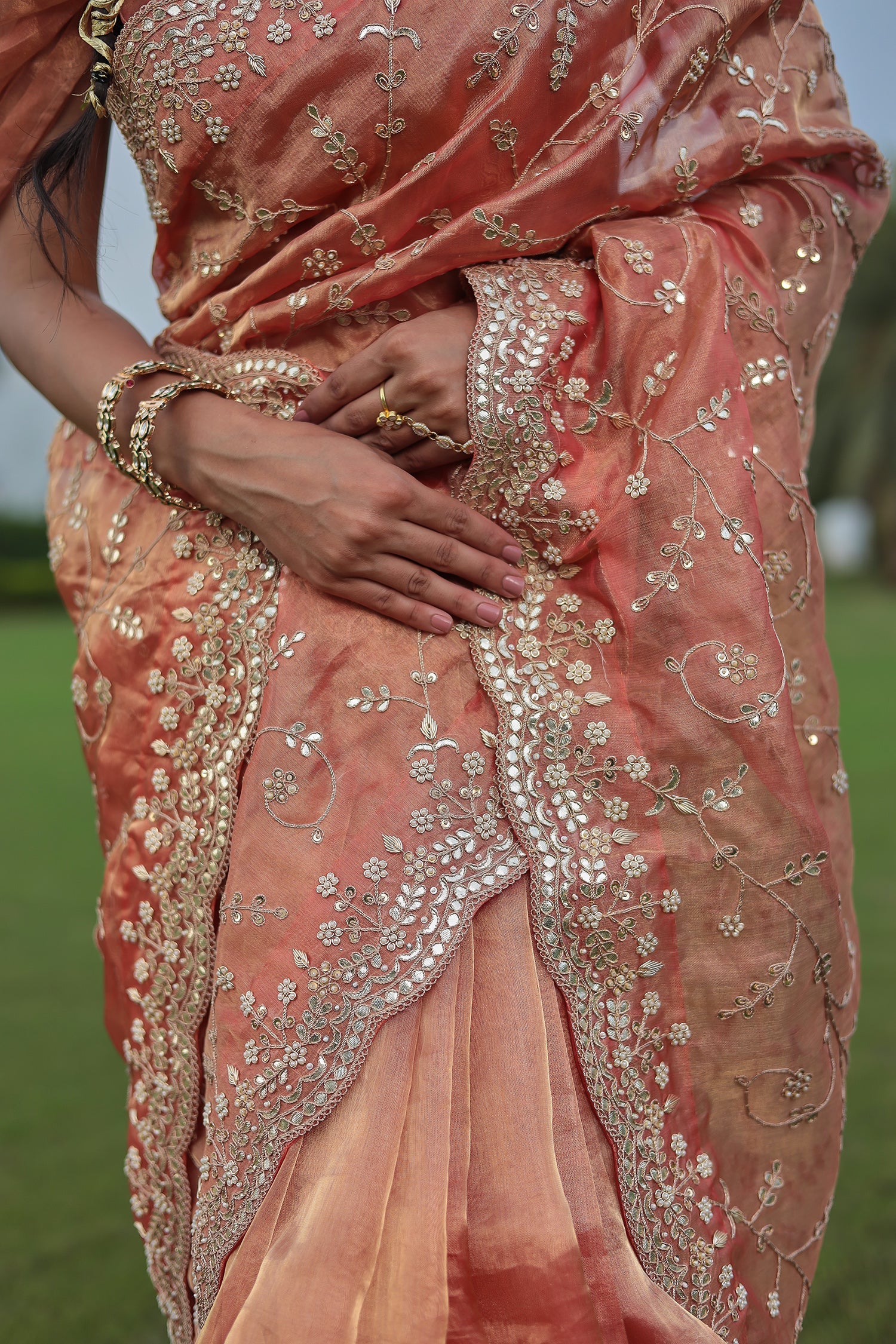 Luxurious Tissue Saree Featuring Pearl, Zardozi, Gota Patti Detailing