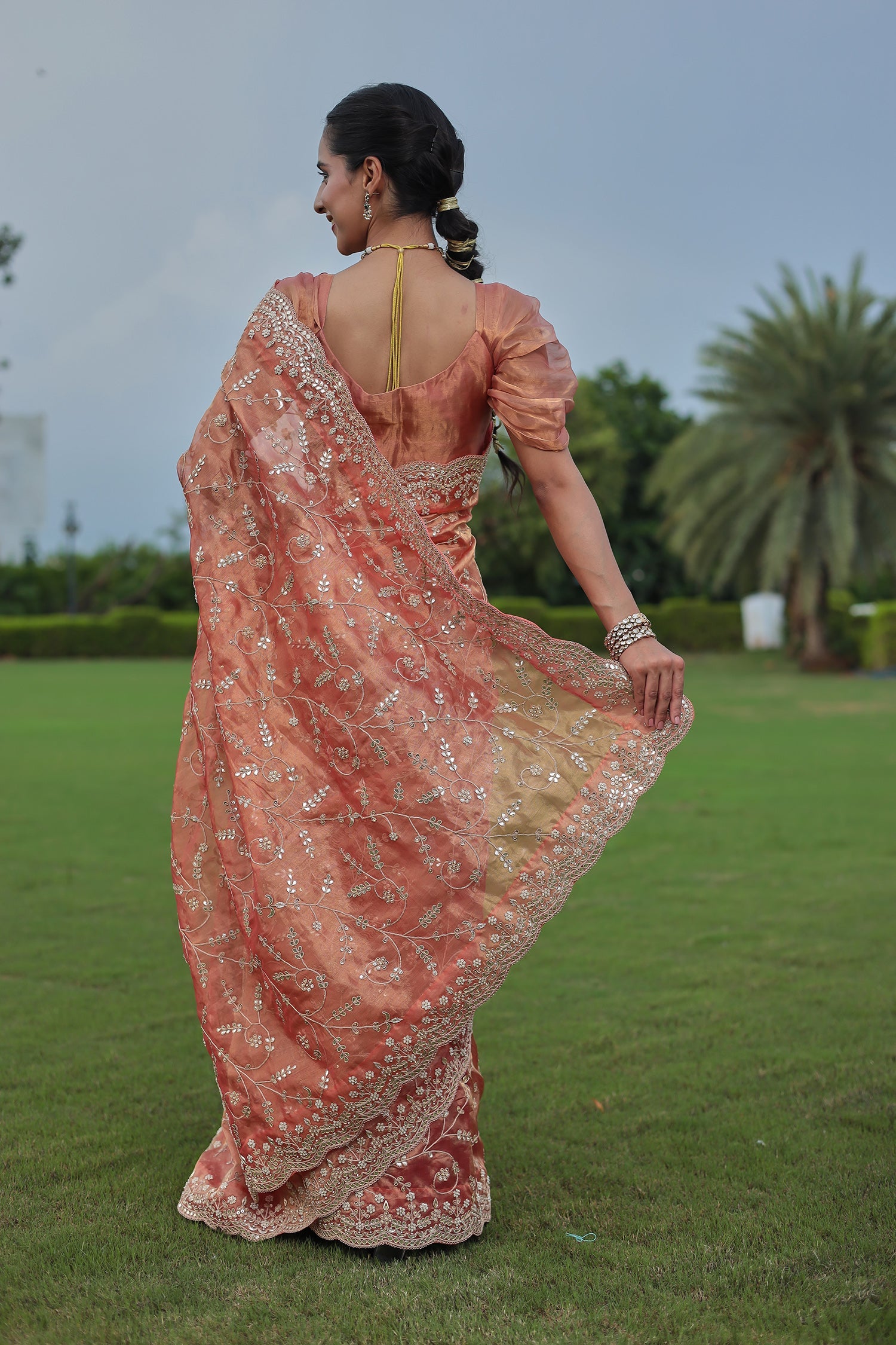 Luxurious Tissue Saree Featuring Pearl, Zardozi, Gota Patti Detailing