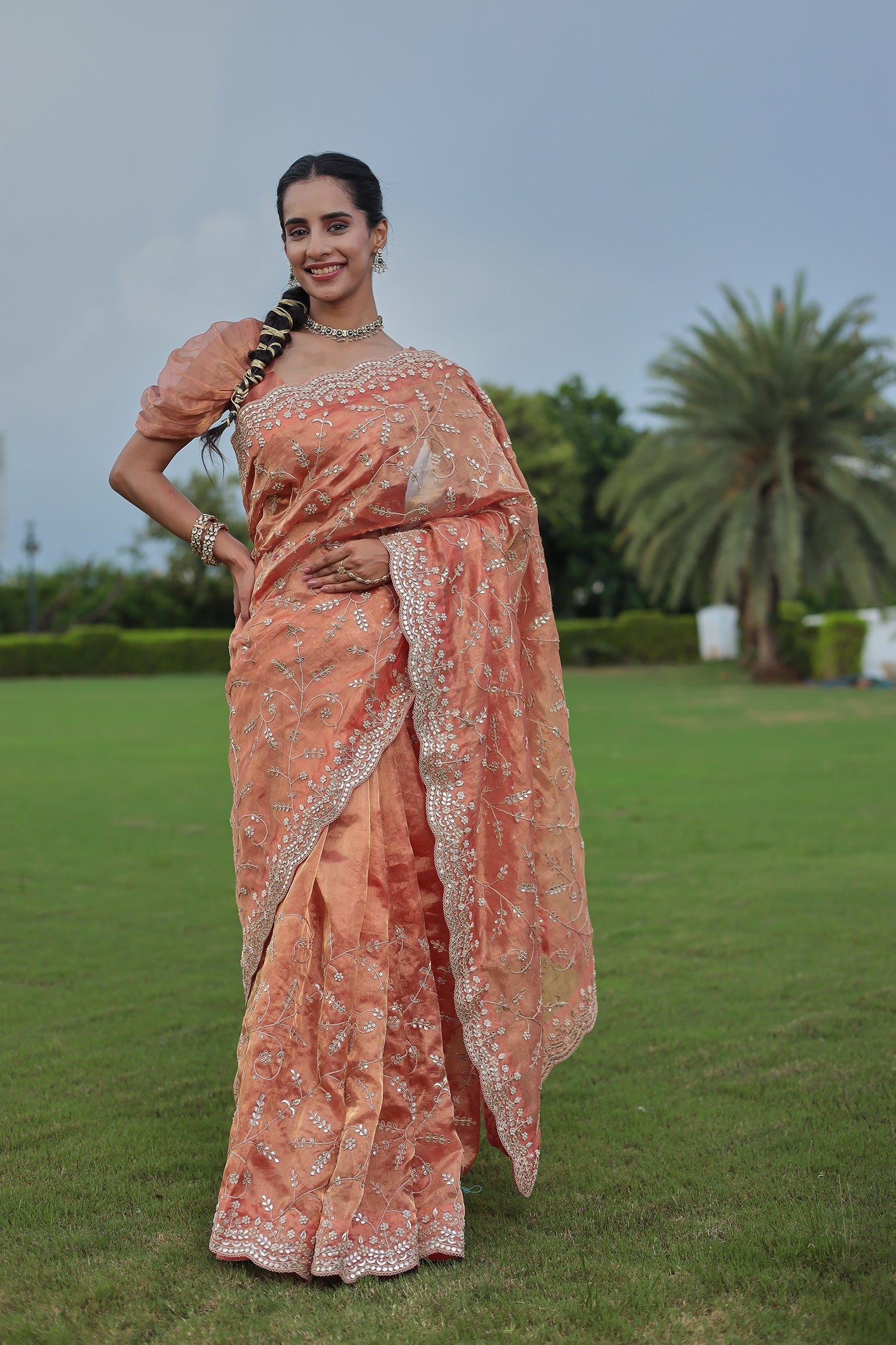 Luxurious Tissue Saree Featuring Pearl, Zardozi, Gota Patti Detailing