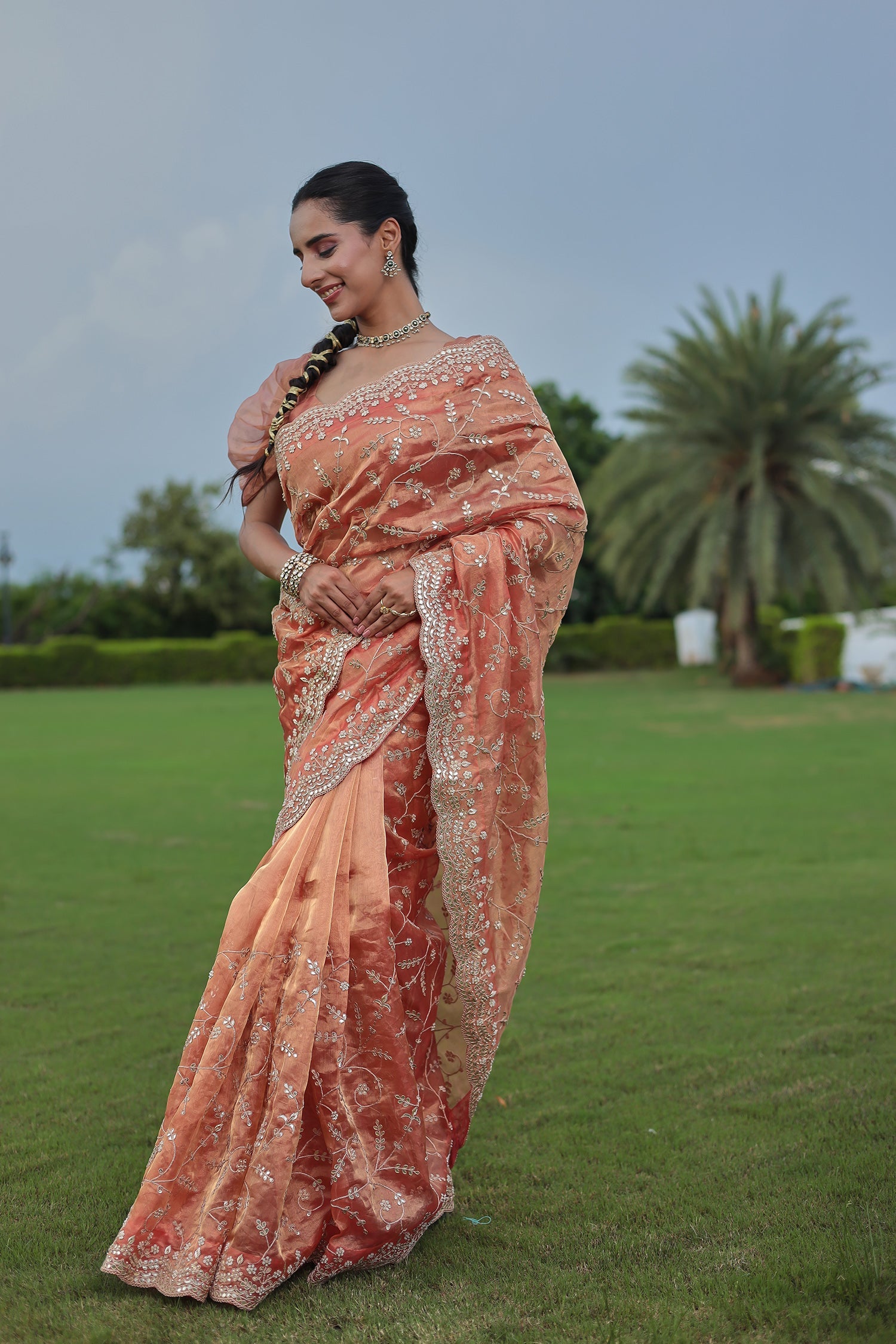 Luxurious Tissue Saree Featuring Pearl, Zardozi, Gota Patti Detailing