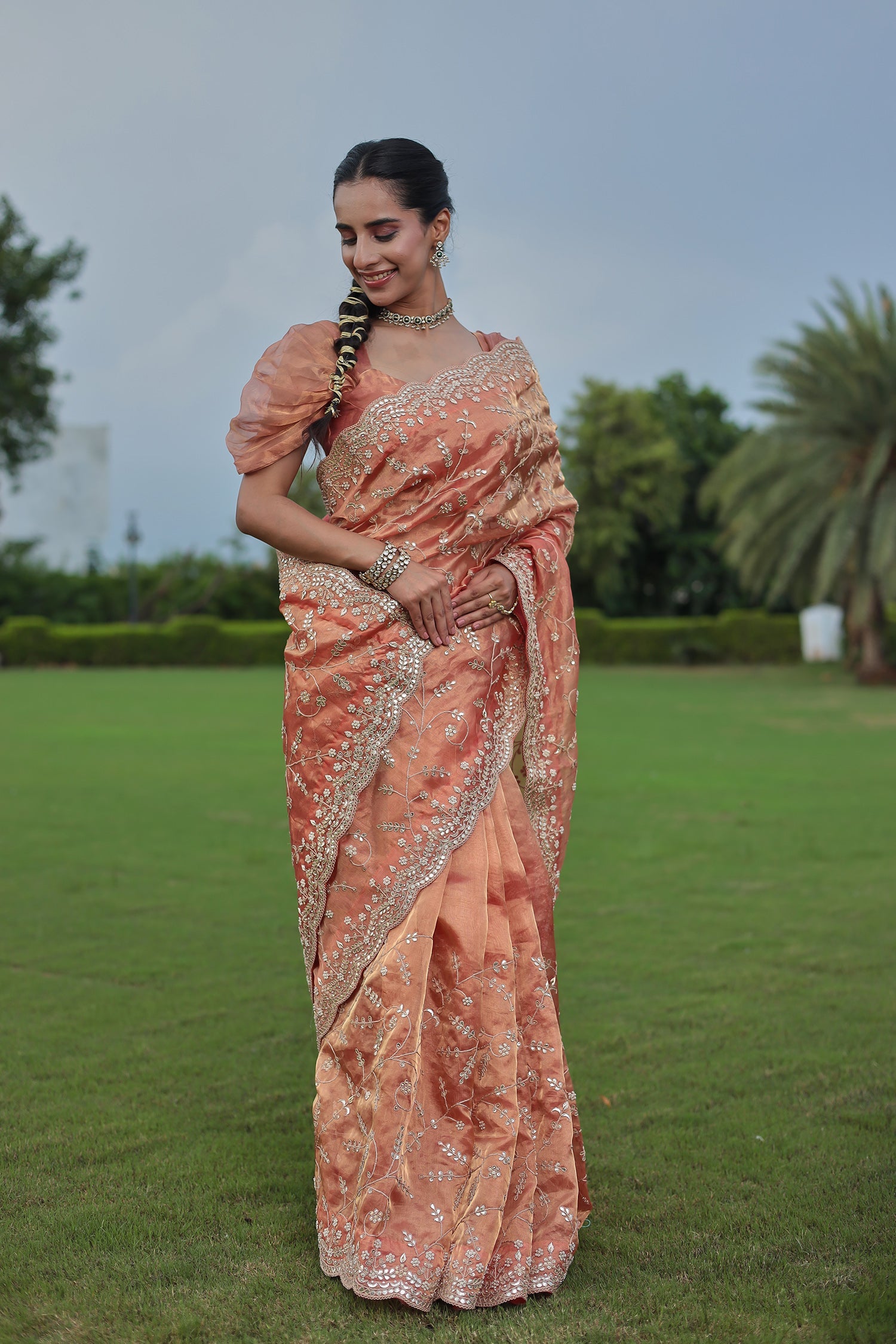 Luxurious Tissue Saree Featuring Pearl, Zardozi, Gota Patti Detailing