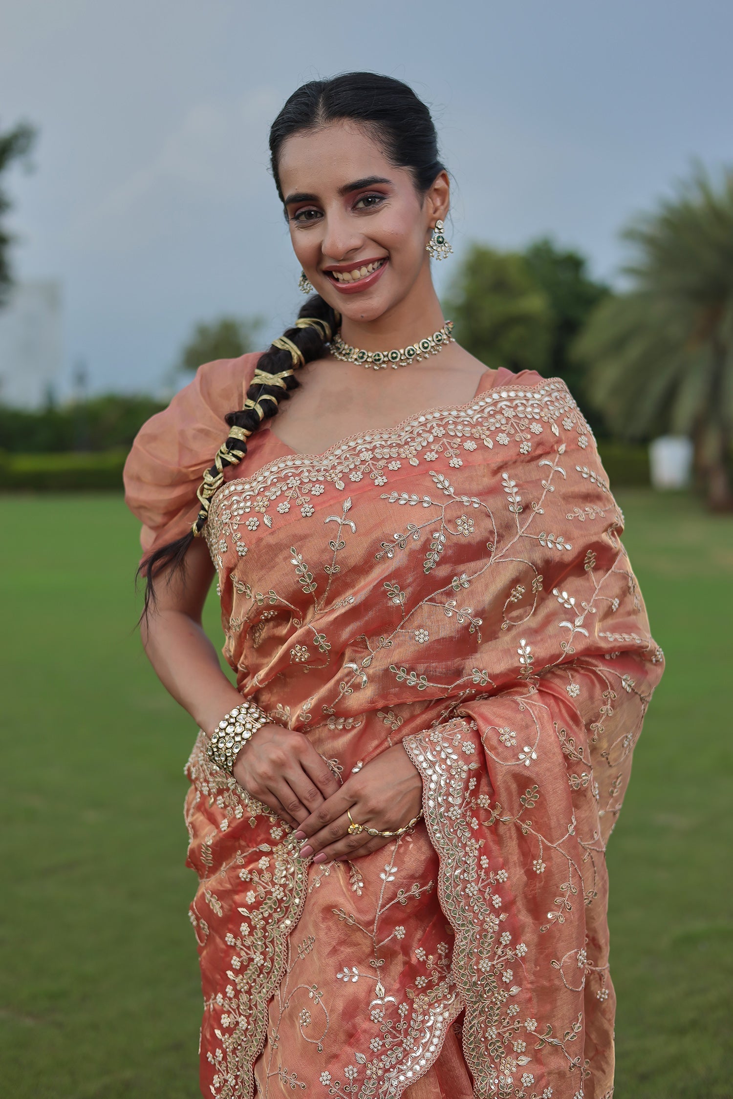 Luxurious Tissue Saree Featuring Pearl, Zardozi, Gota Patti Detailing