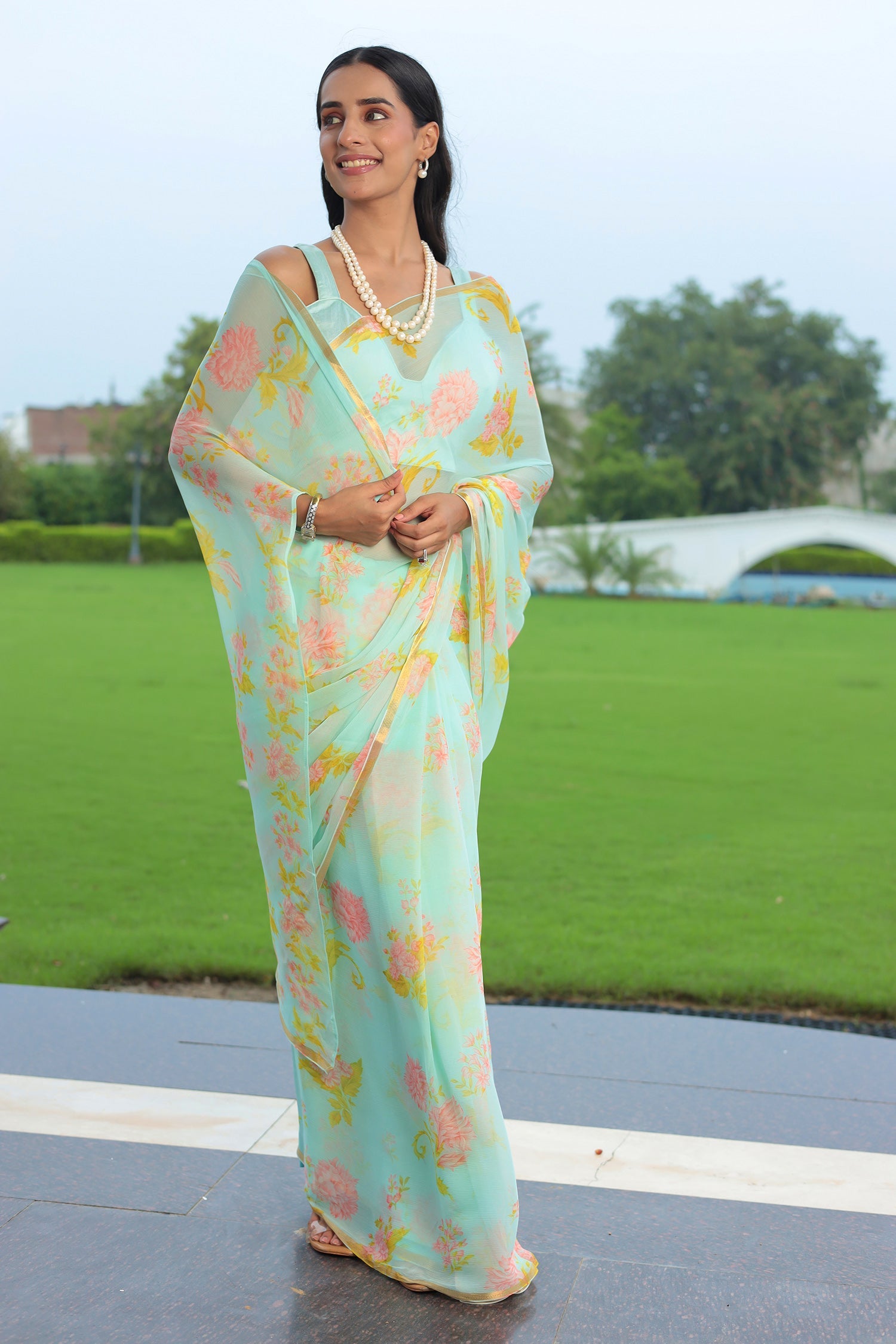 Chiffon  Saree  with Printed, Zari border work.