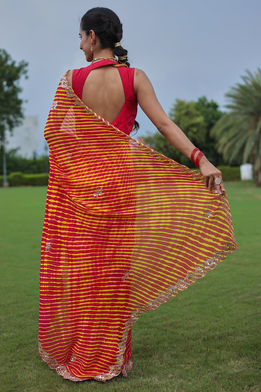Leheriya Georgette Saree with Aari and Gota Patti work
