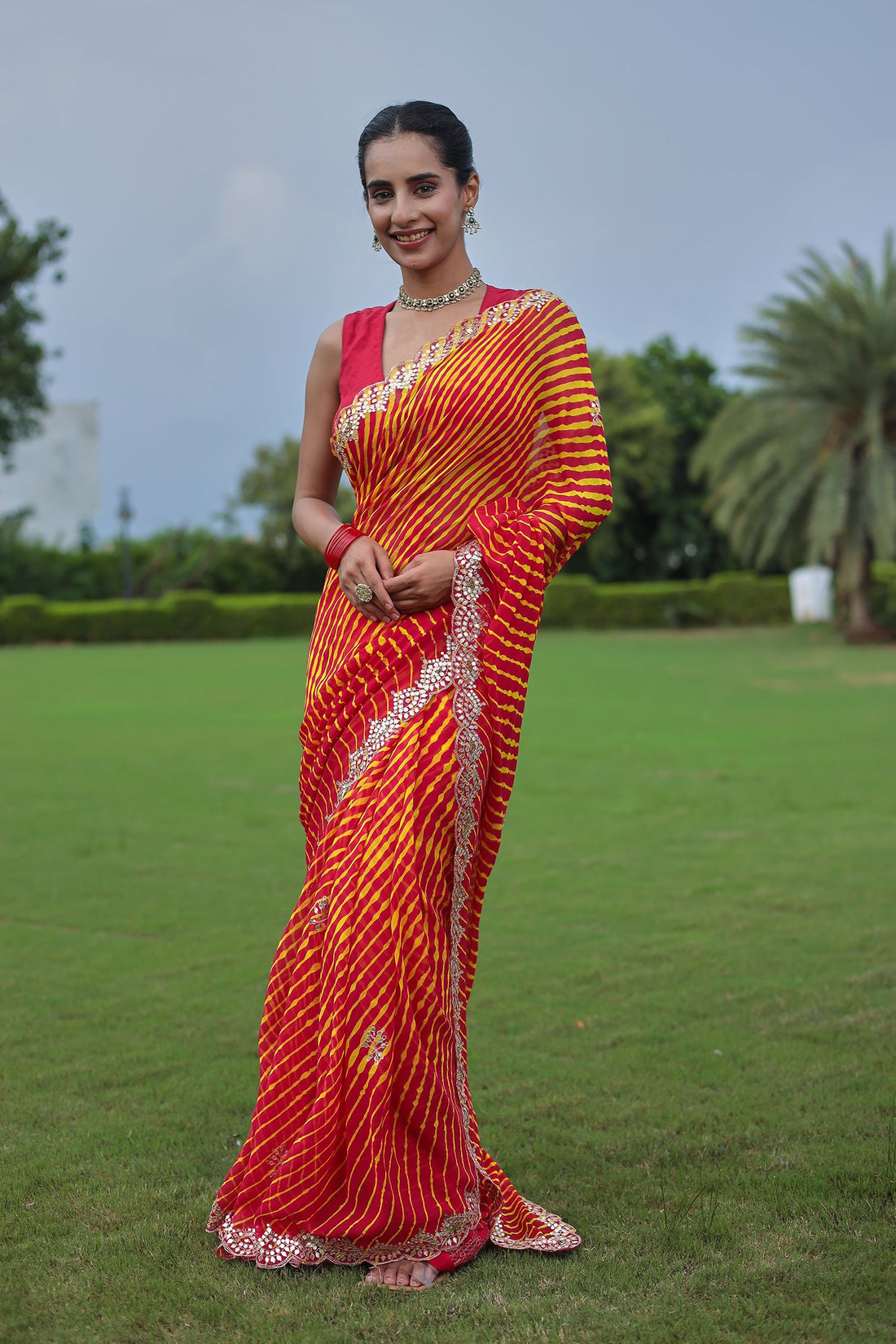 Leheriya Georgette Saree with Aari and Gota Patti work