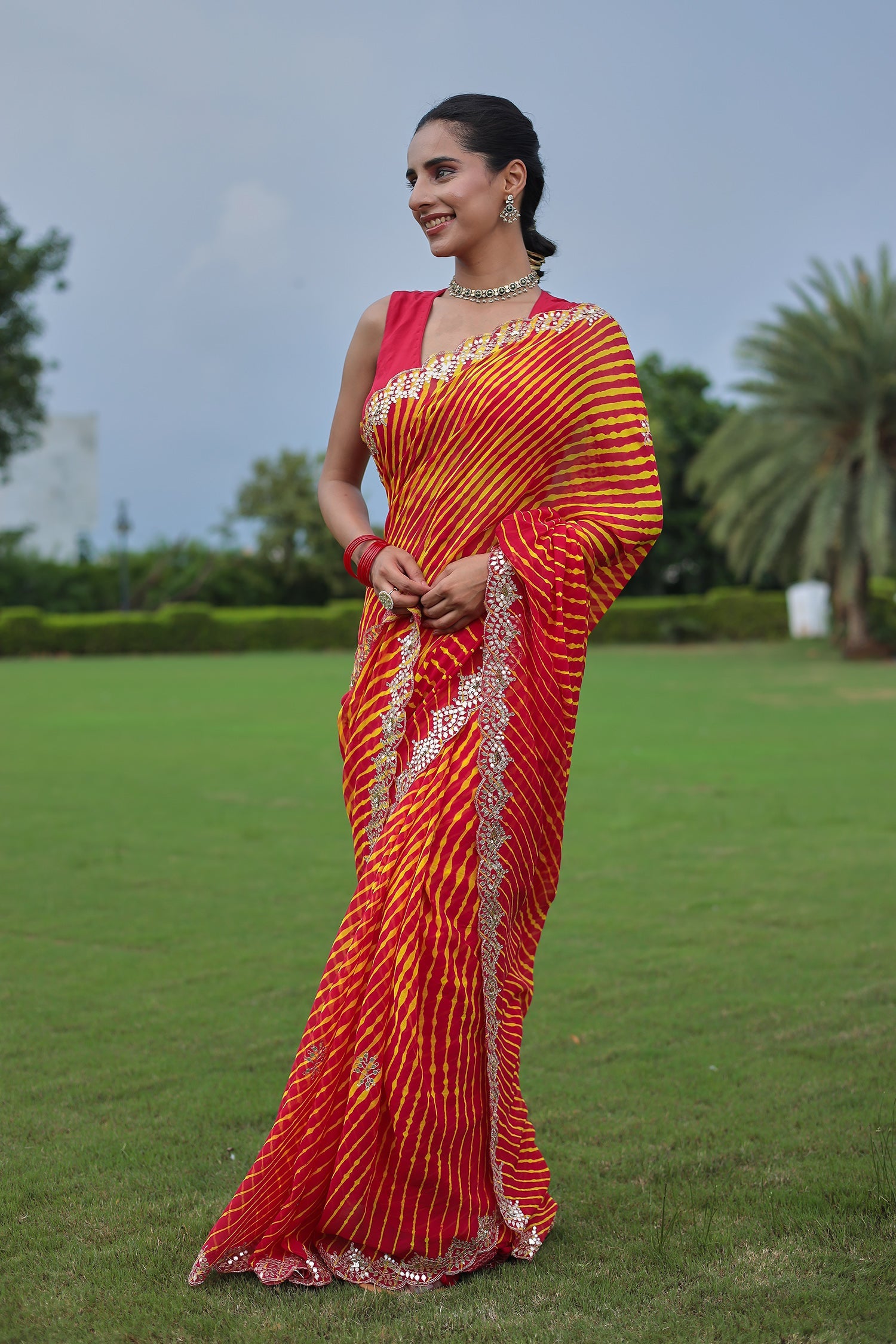 Leheriya Georgette Saree with Aari and Gota Patti work