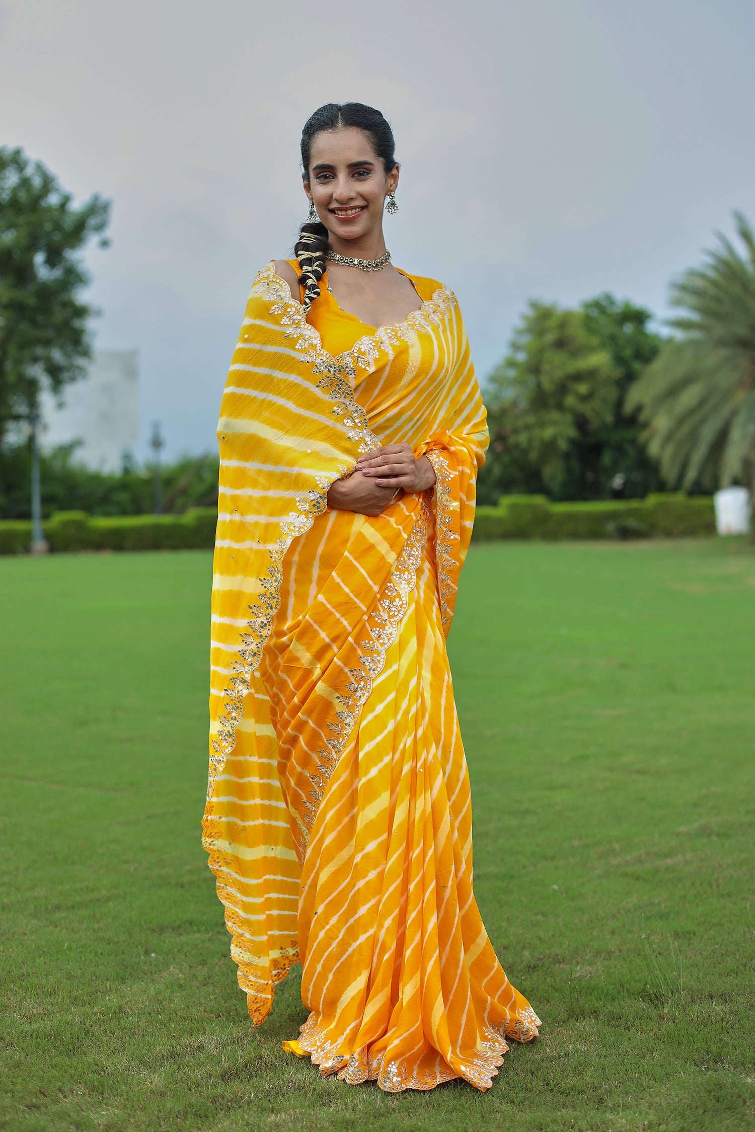 Leheriya Silk Saree with Timeless Aari and Gota Patti Embroidery