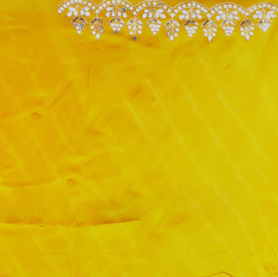 Leheriya Silk Saree with Timeless Aari and Gota Patti Embroidery