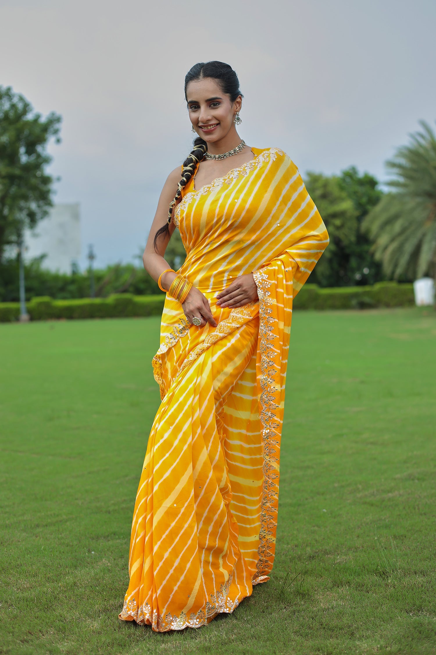 Leheriya Silk Saree with Timeless Aari and Gota Patti Embroidery