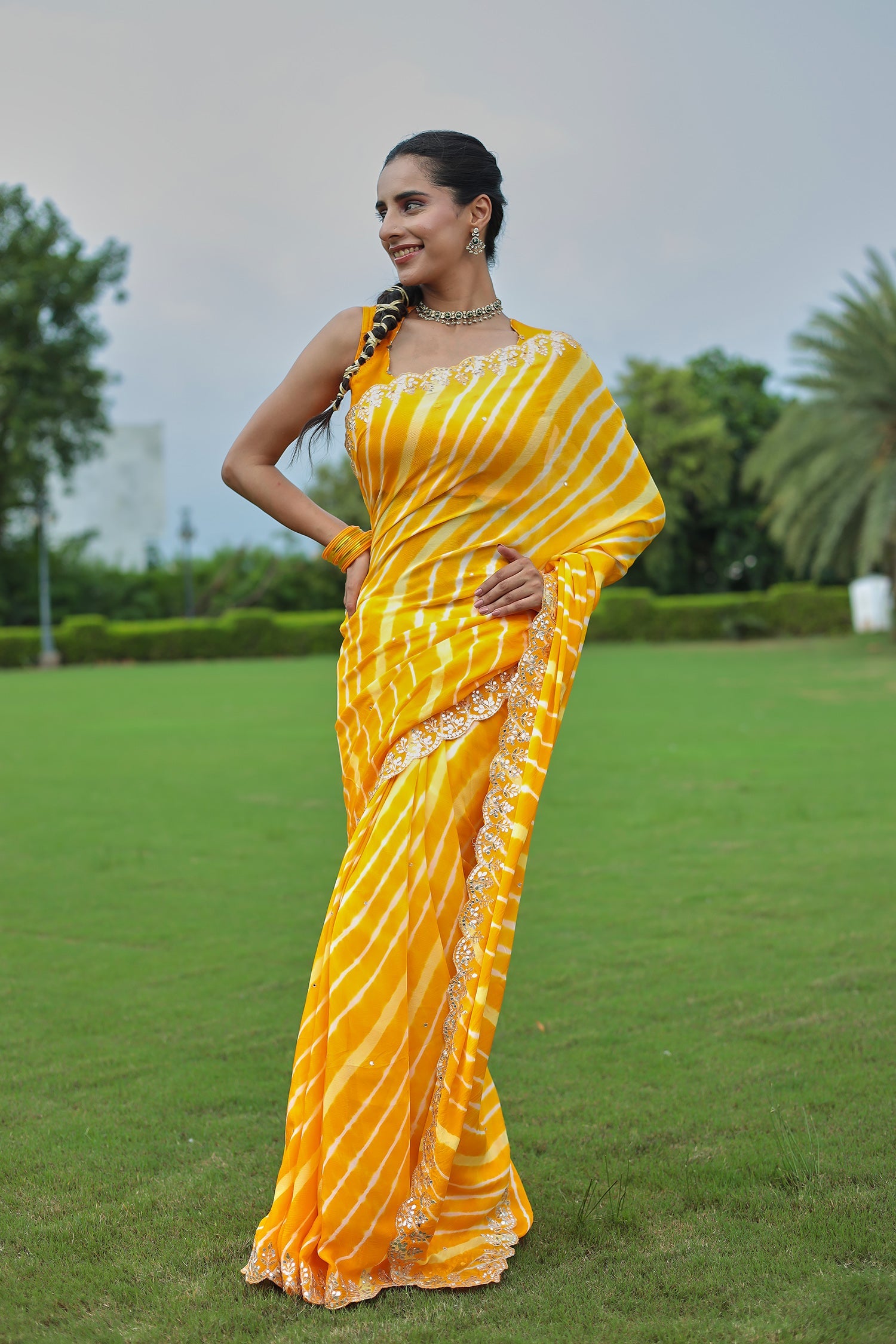 Leheriya Silk Saree with Timeless Aari and Gota Patti Embroidery