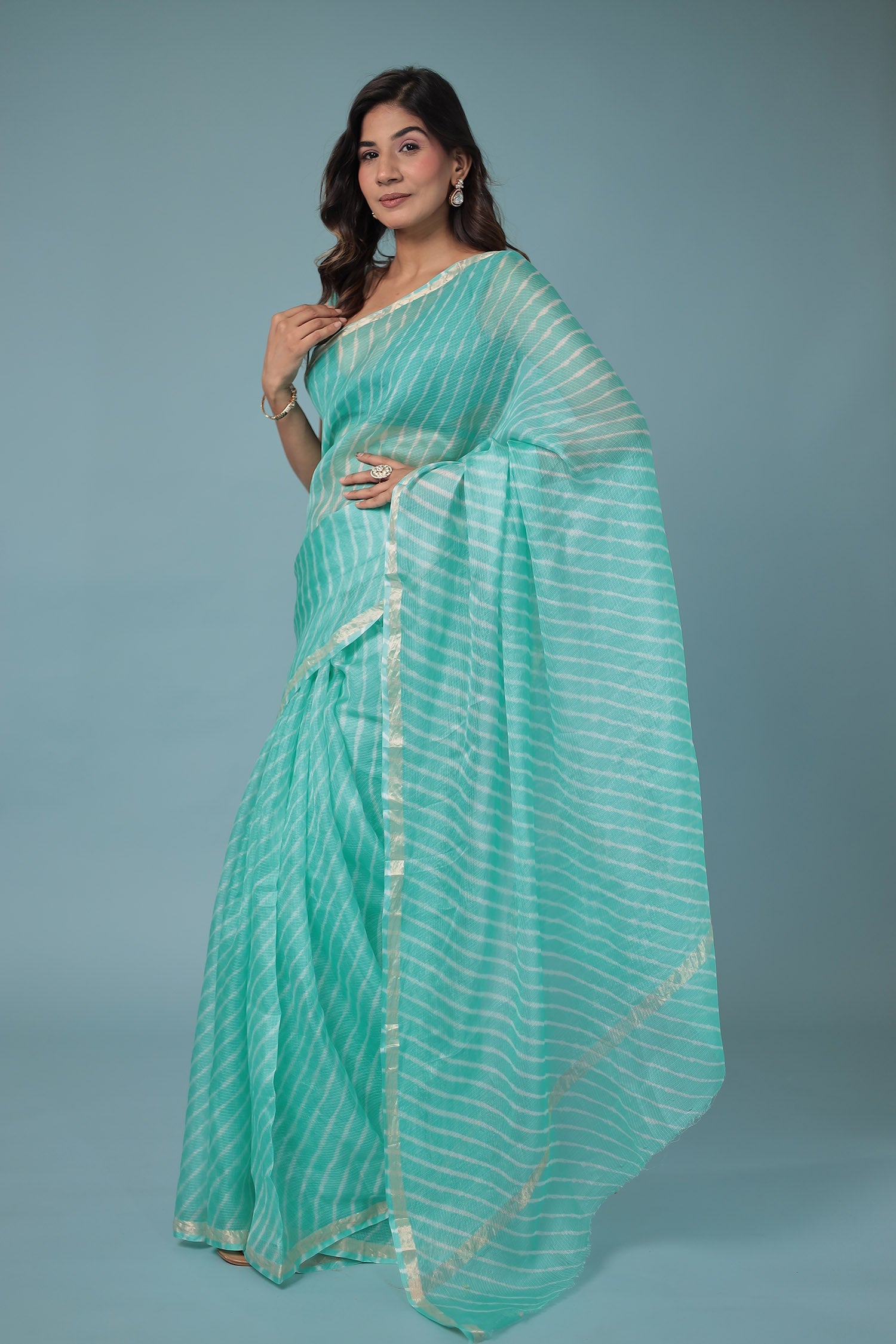 Kota Doria Silk Leheriya Saree with Zari work.
