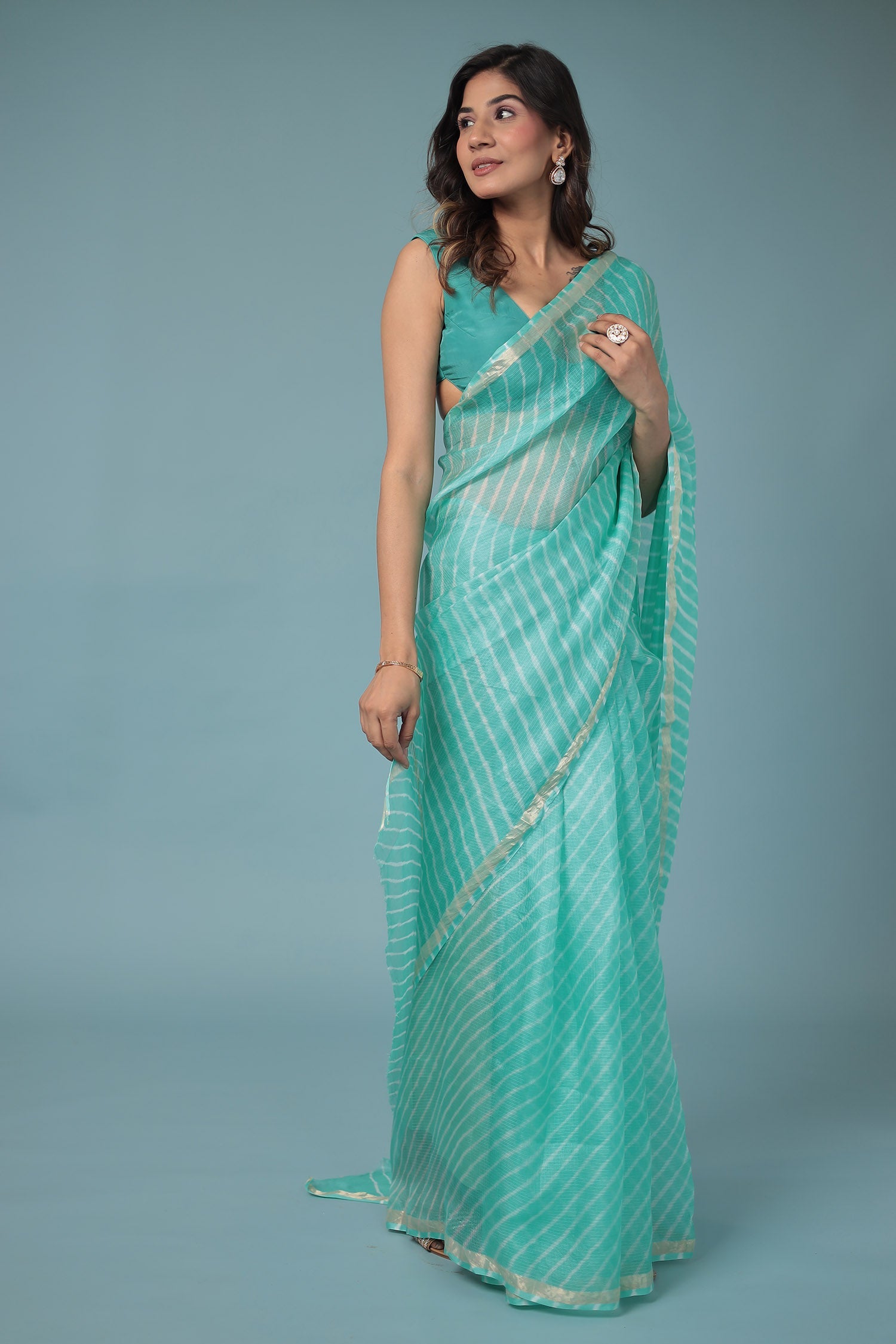 Kota Doria Silk Leheriya Saree with Zari work.