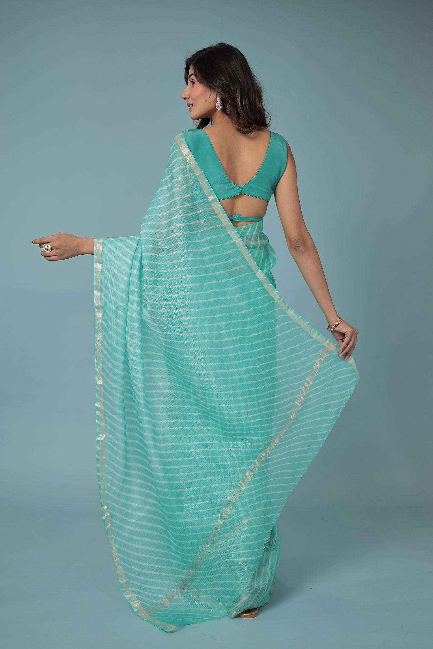 Kota Doria Silk Leheriya Saree with Zari work.
