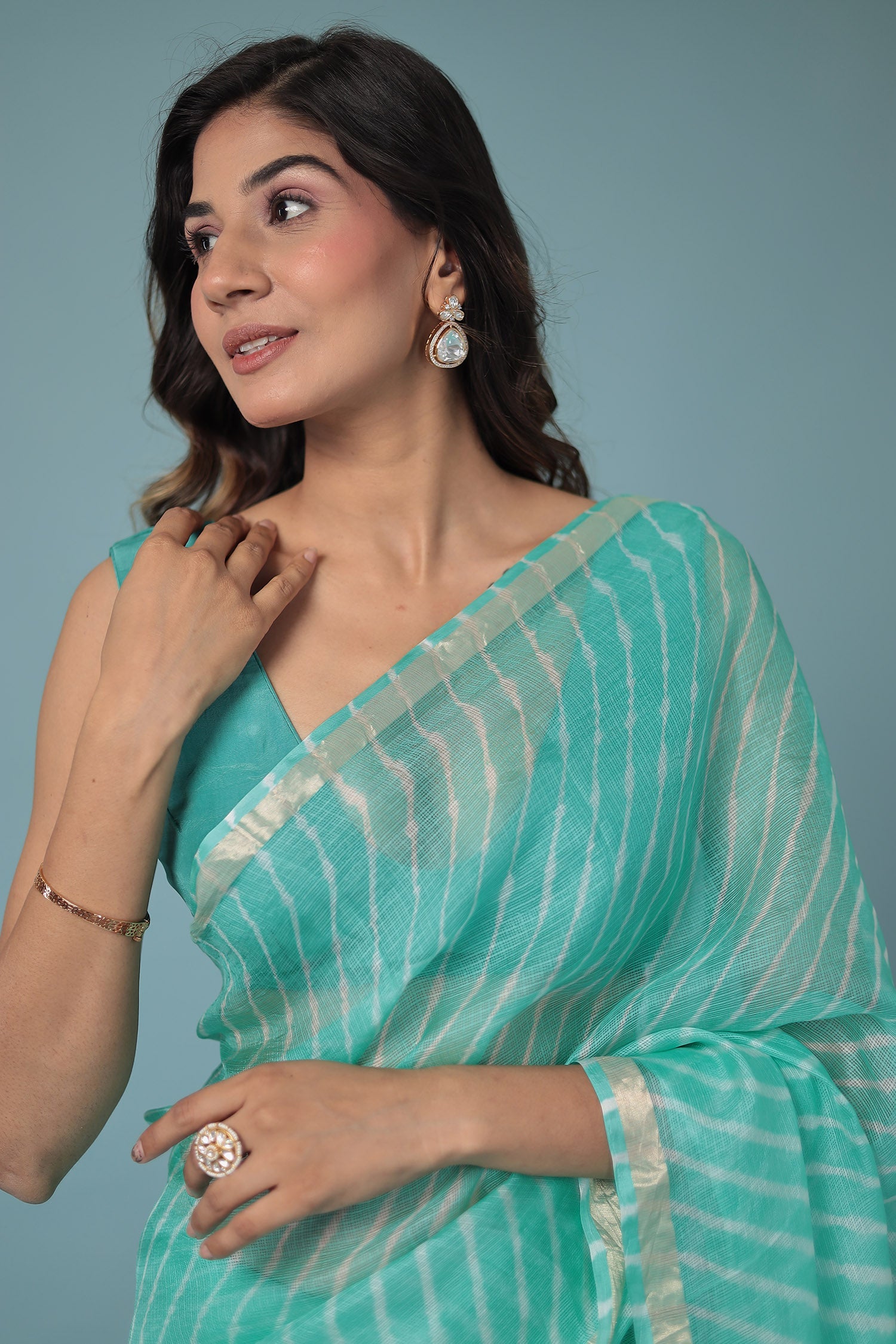 Kota Doria Silk Leheriya Saree with Zari work.