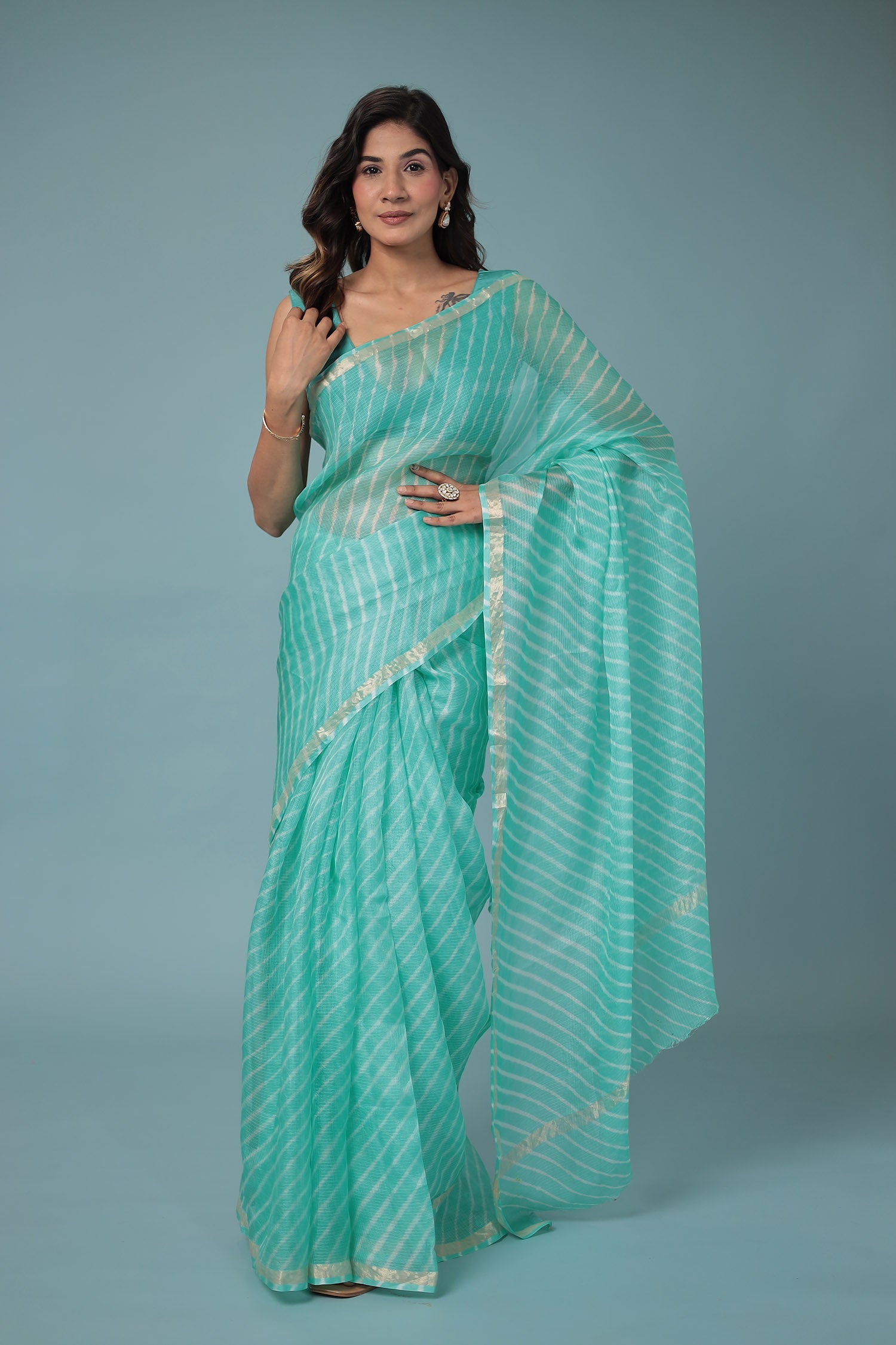 Kota Doria Silk Leheriya Saree with Zari work.