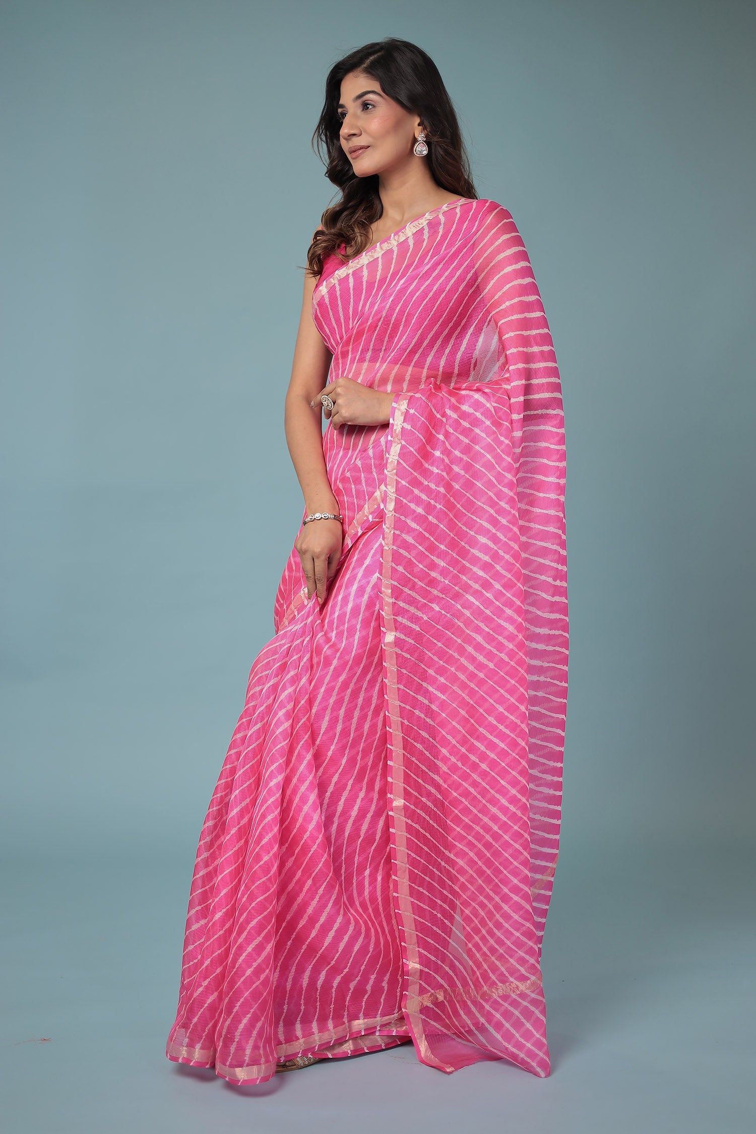 Kota Doria Silk Leheriya Saree with Zari work.