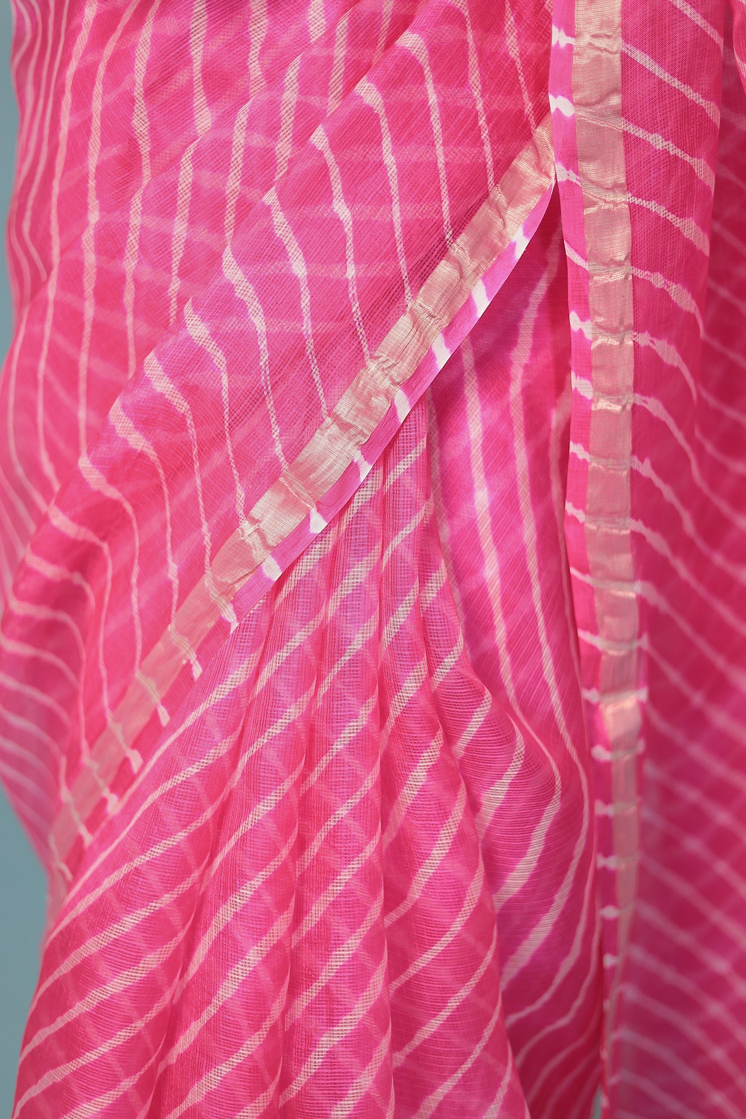 Kota Doria Silk Leheriya Saree with Zari work.
