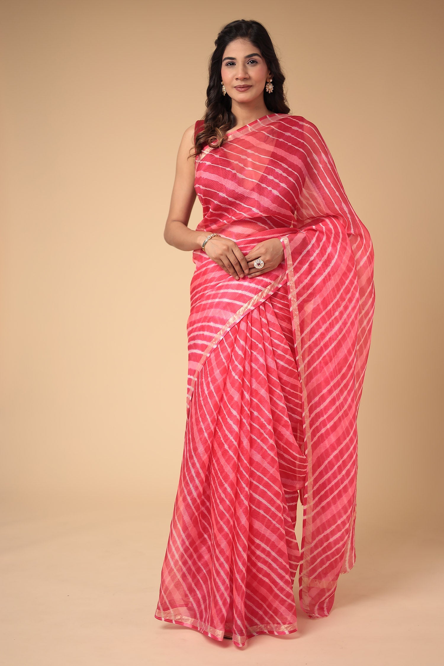 Kota Doria Silk Leheriya Saree with Zari work.
