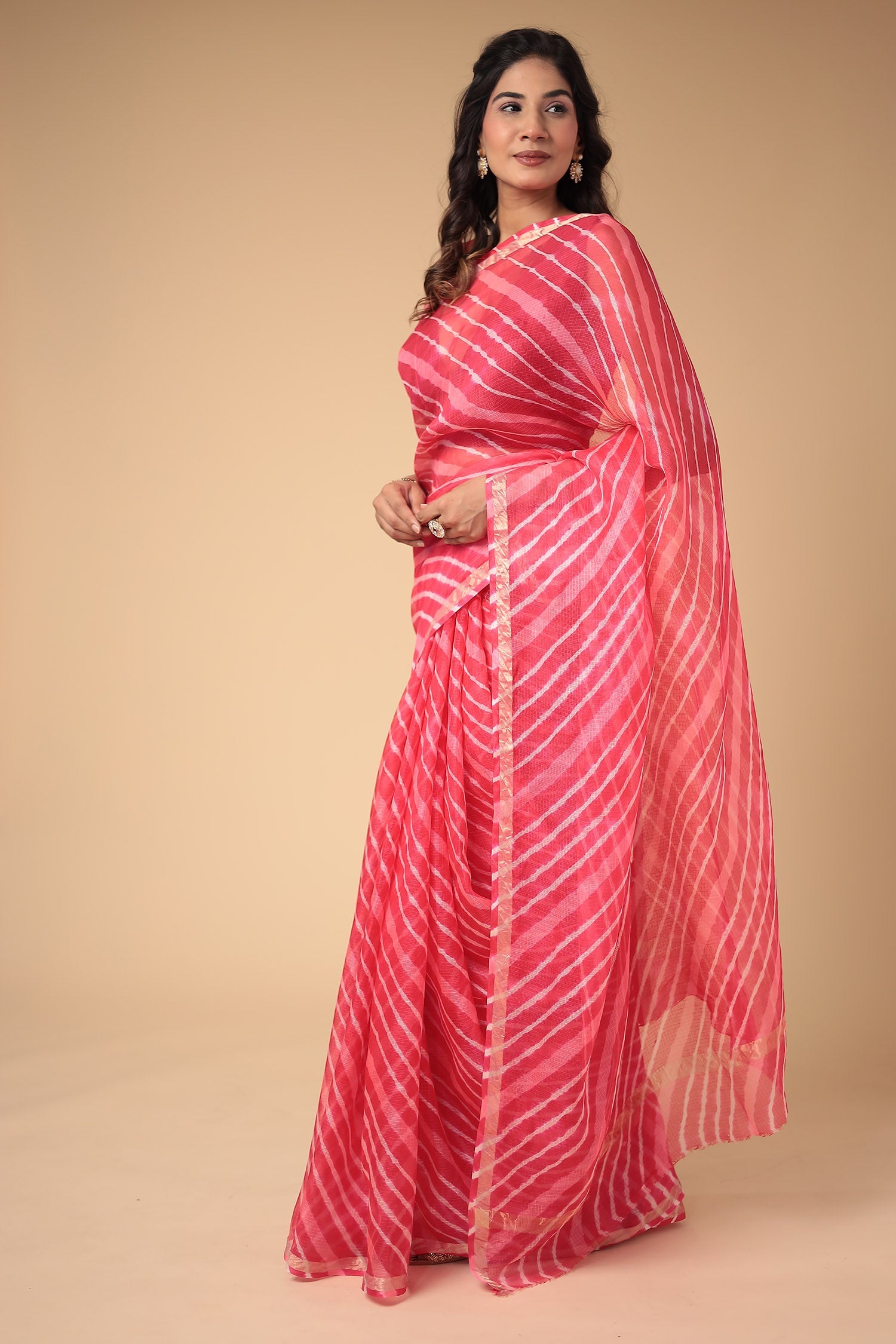 Kota Doria Silk Leheriya Saree with Zari work.
