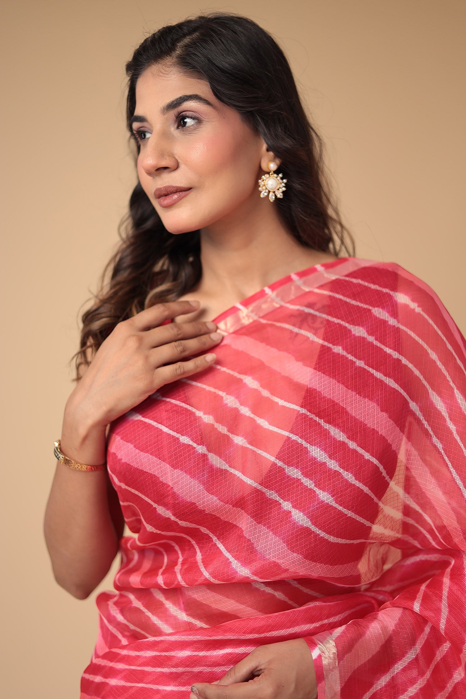 Kota Doria Silk Leheriya Saree with Zari work.
