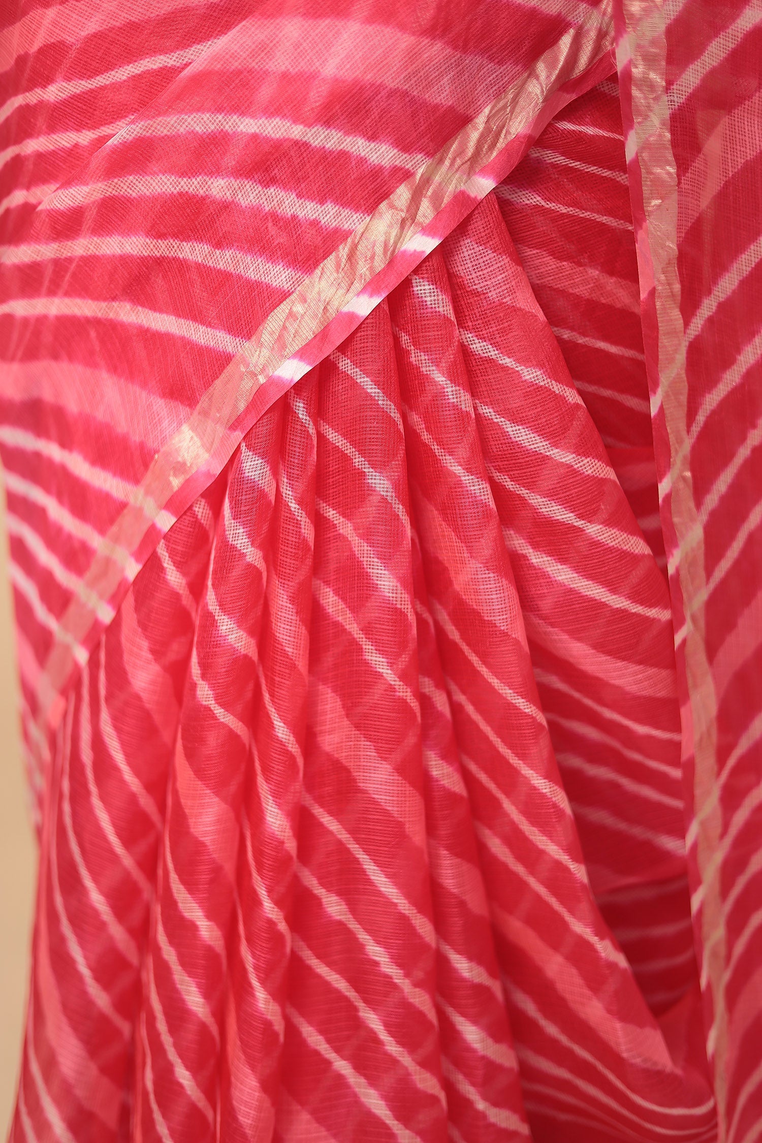 Kota Doria Silk Leheriya Saree with Zari work.