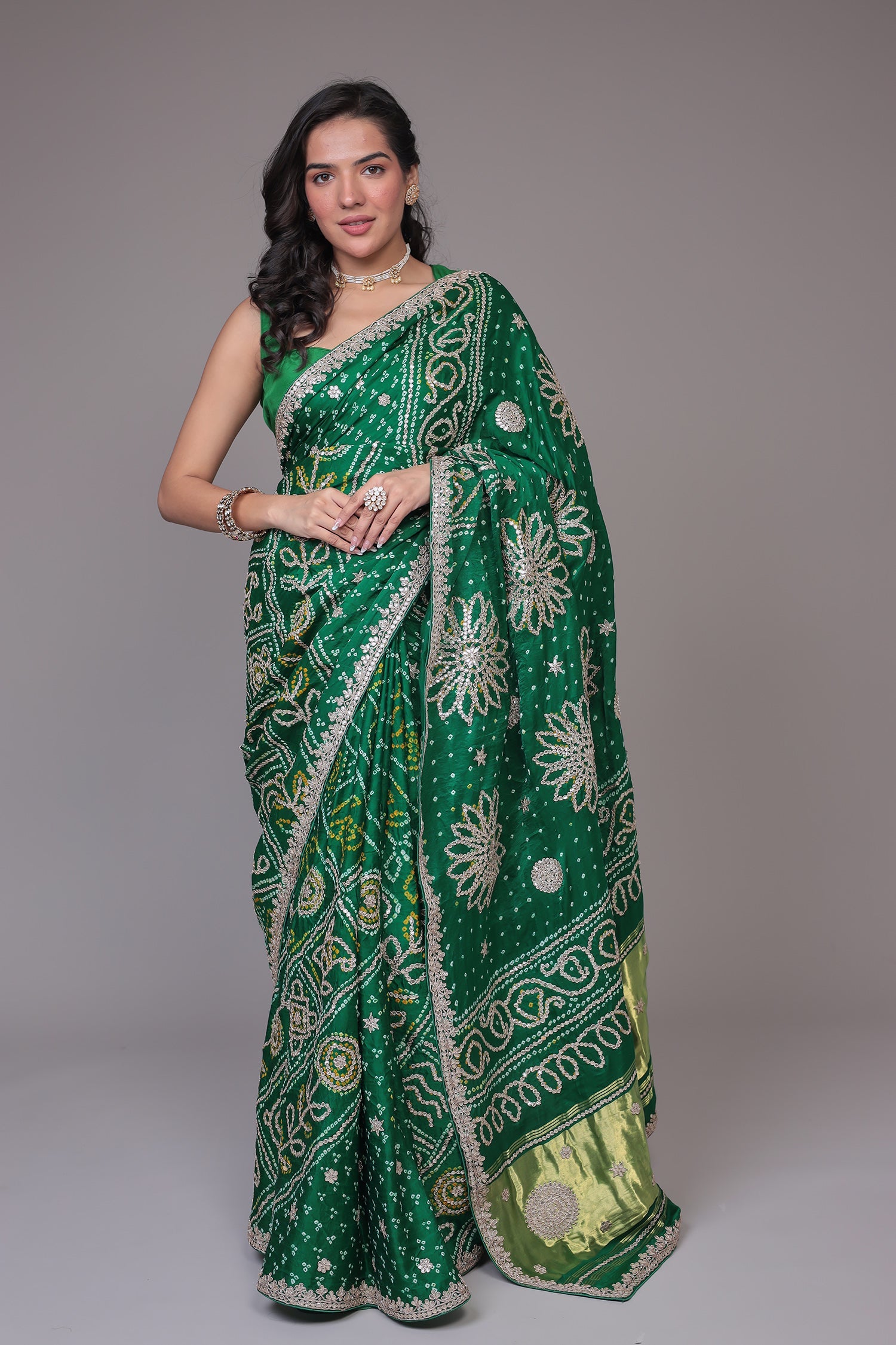 Green Bandhej Silk Embroidered Saree .