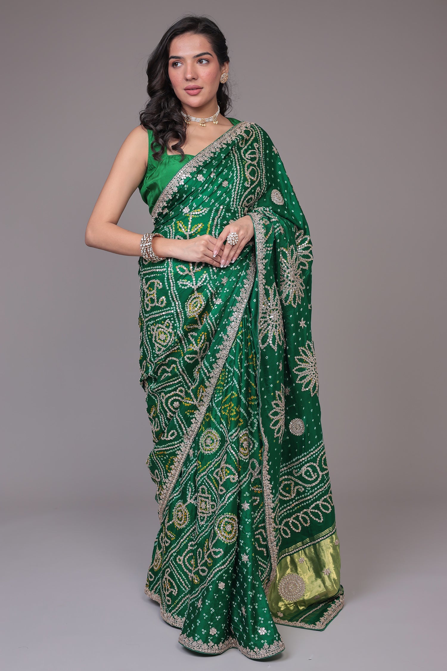 Green Bandhej Silk Embroidered Saree .