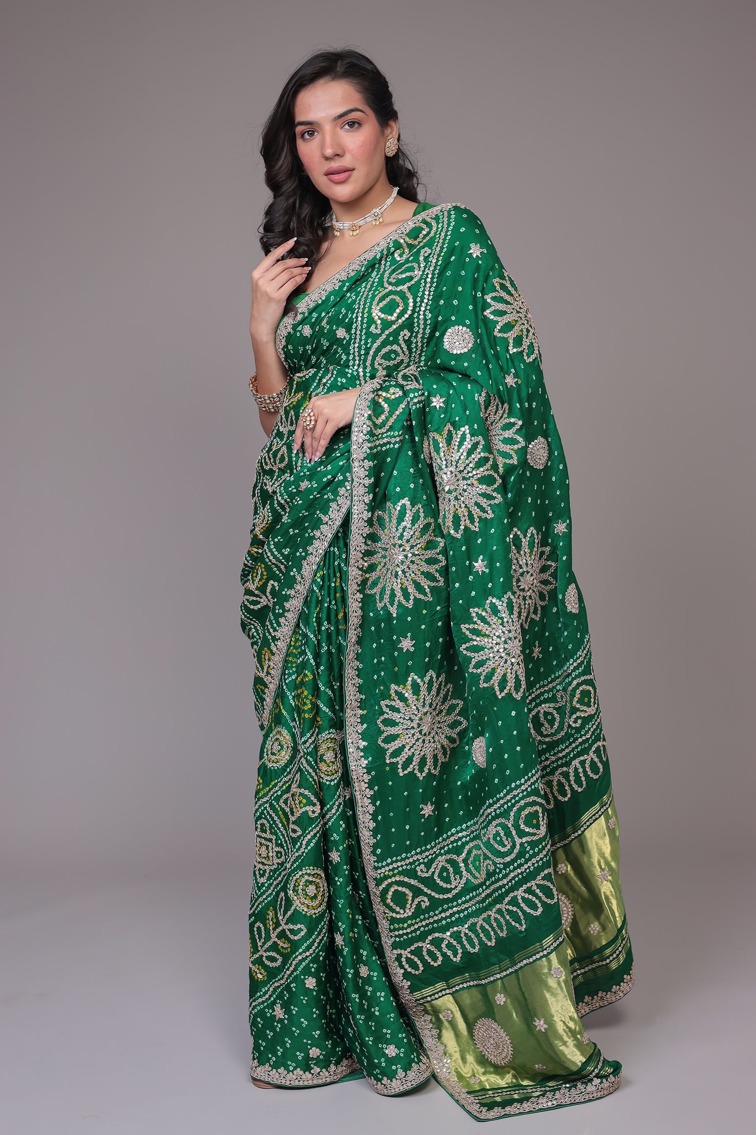 Green Bandhej Silk Embroidered Saree .
