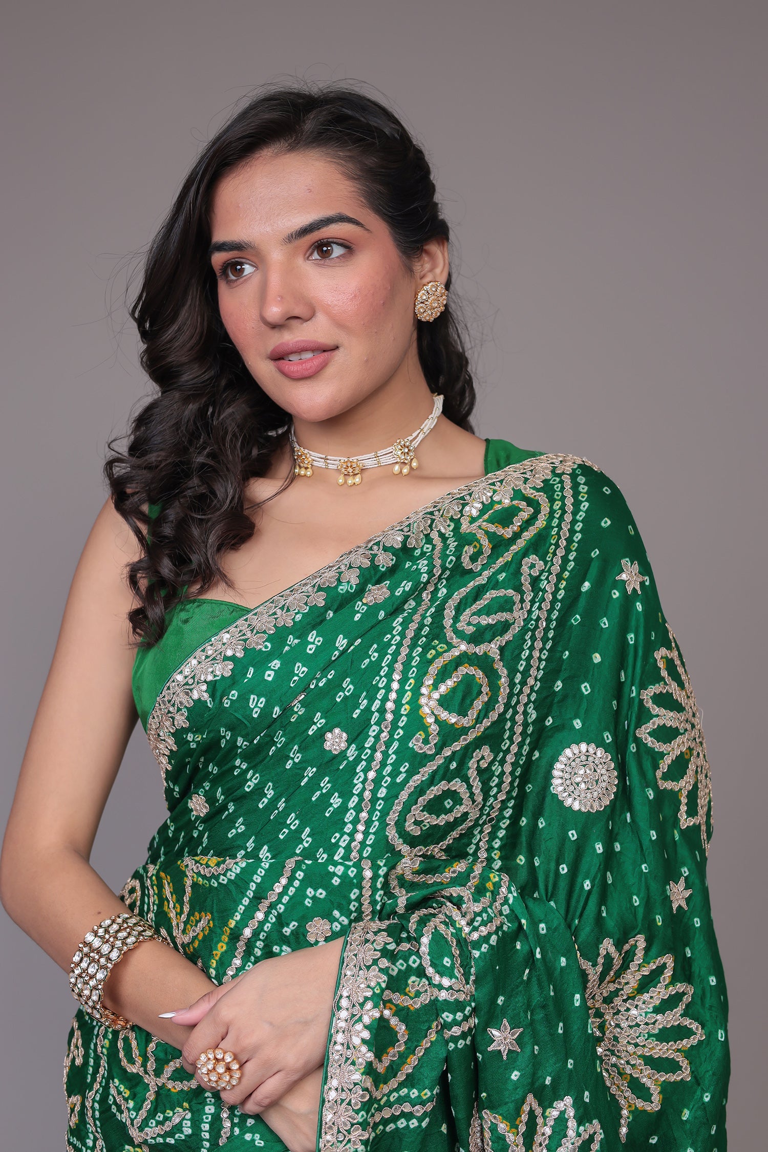 Green Bandhej Silk Embroidered Saree .