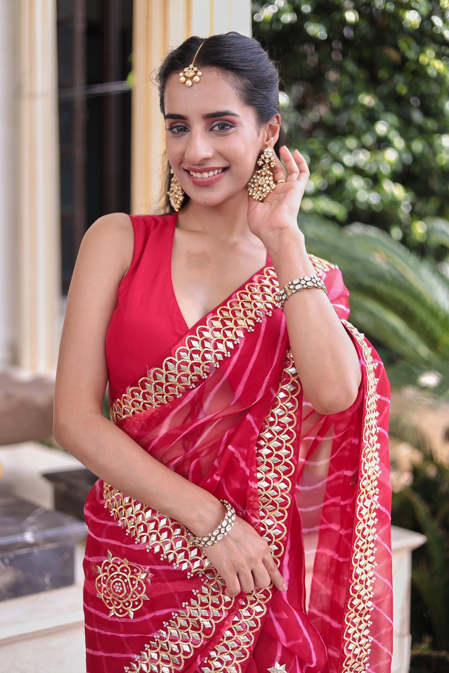 Graceful Leheriya Organza Saree Embellished with Gota Patti Work