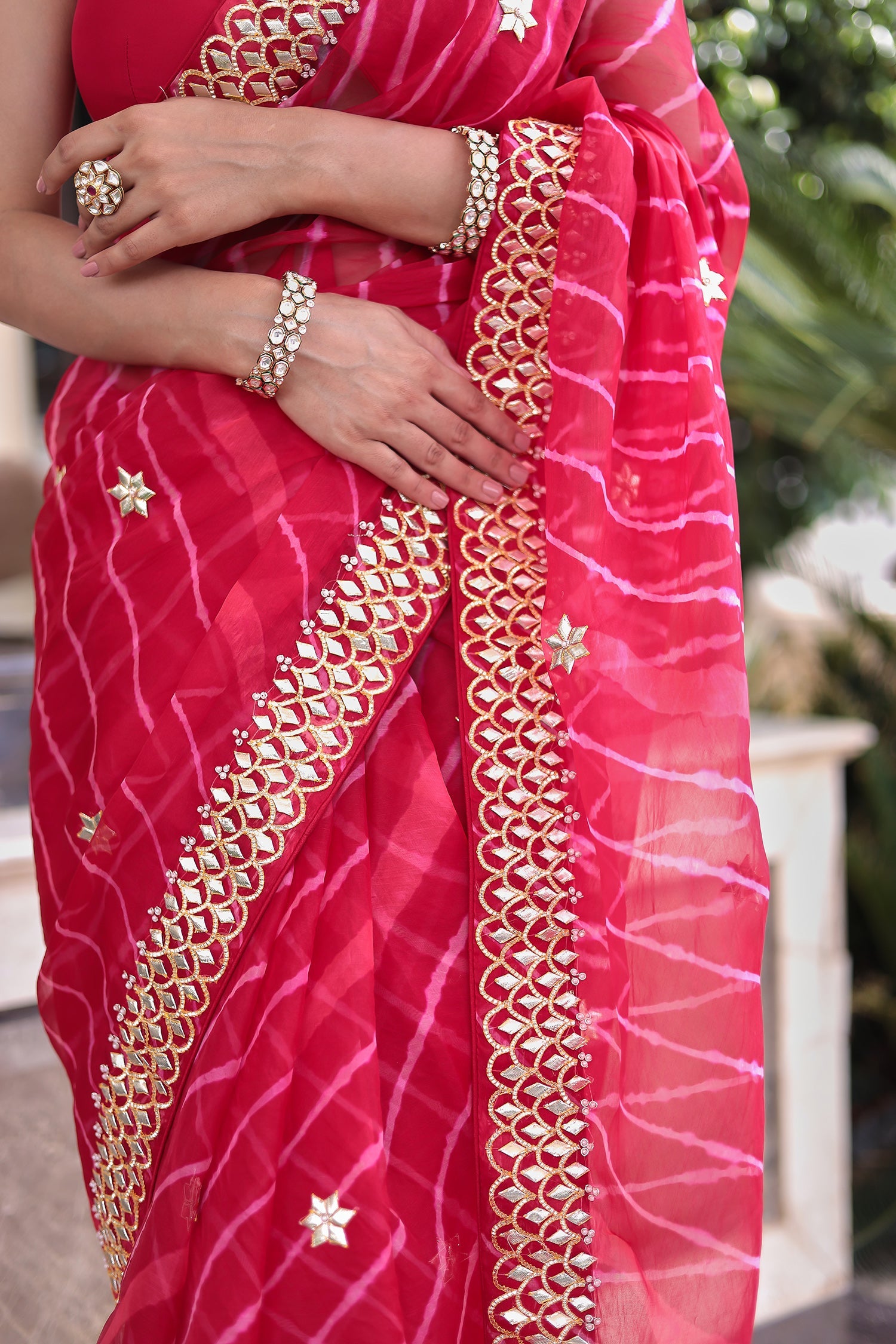 Graceful Leheriya Organza Saree Embellished with Gota Patti Work