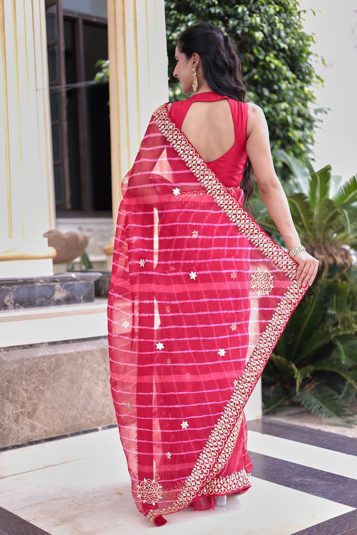 Graceful Leheriya Organza Saree Embellished with Gota Patti Work