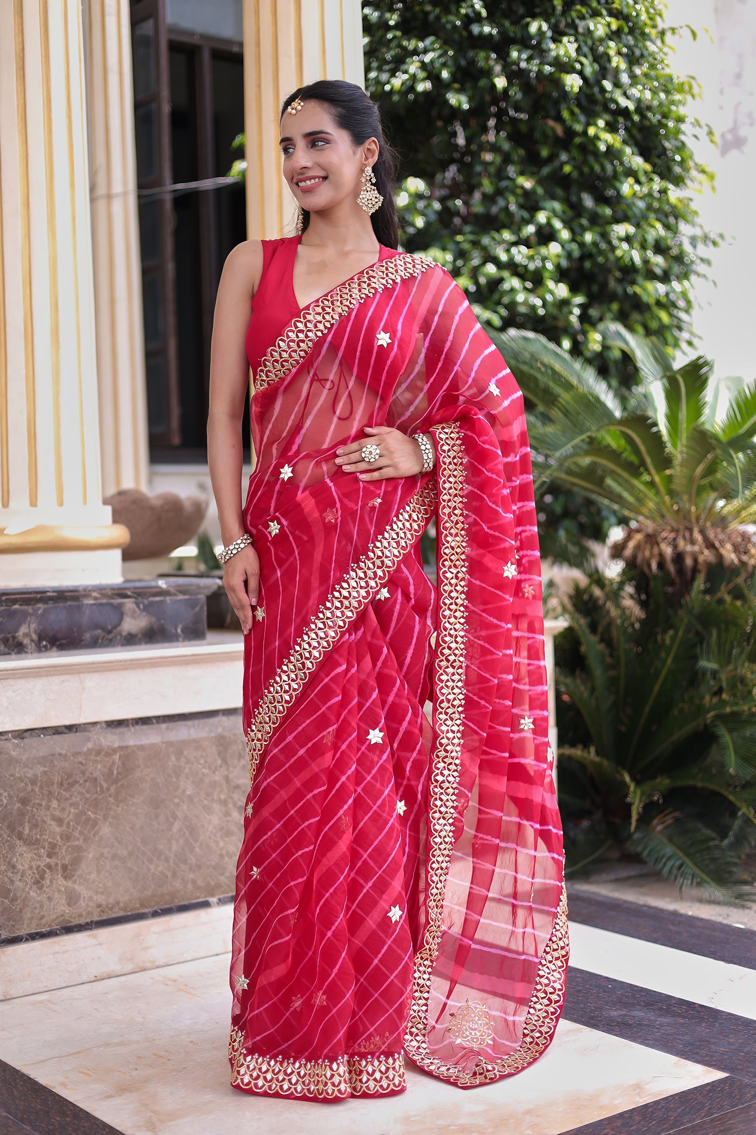 Graceful Leheriya Organza Saree Embellished with Gota Patti Work