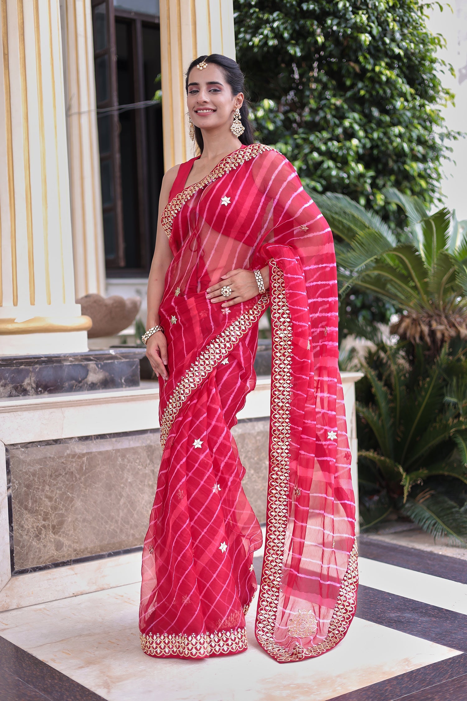 Graceful Leheriya Organza Saree Embellished with Gota Patti Work