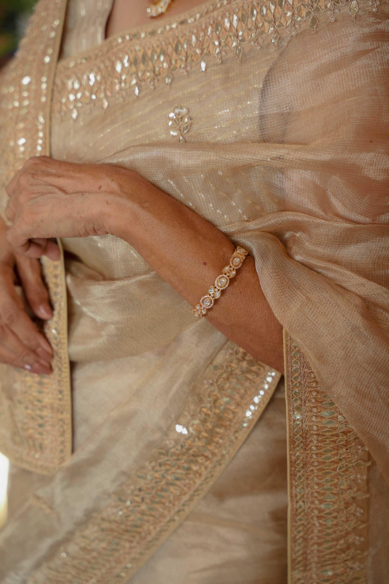Tissue Saree Embroidered with Dori, Gota Patti and Pearl work