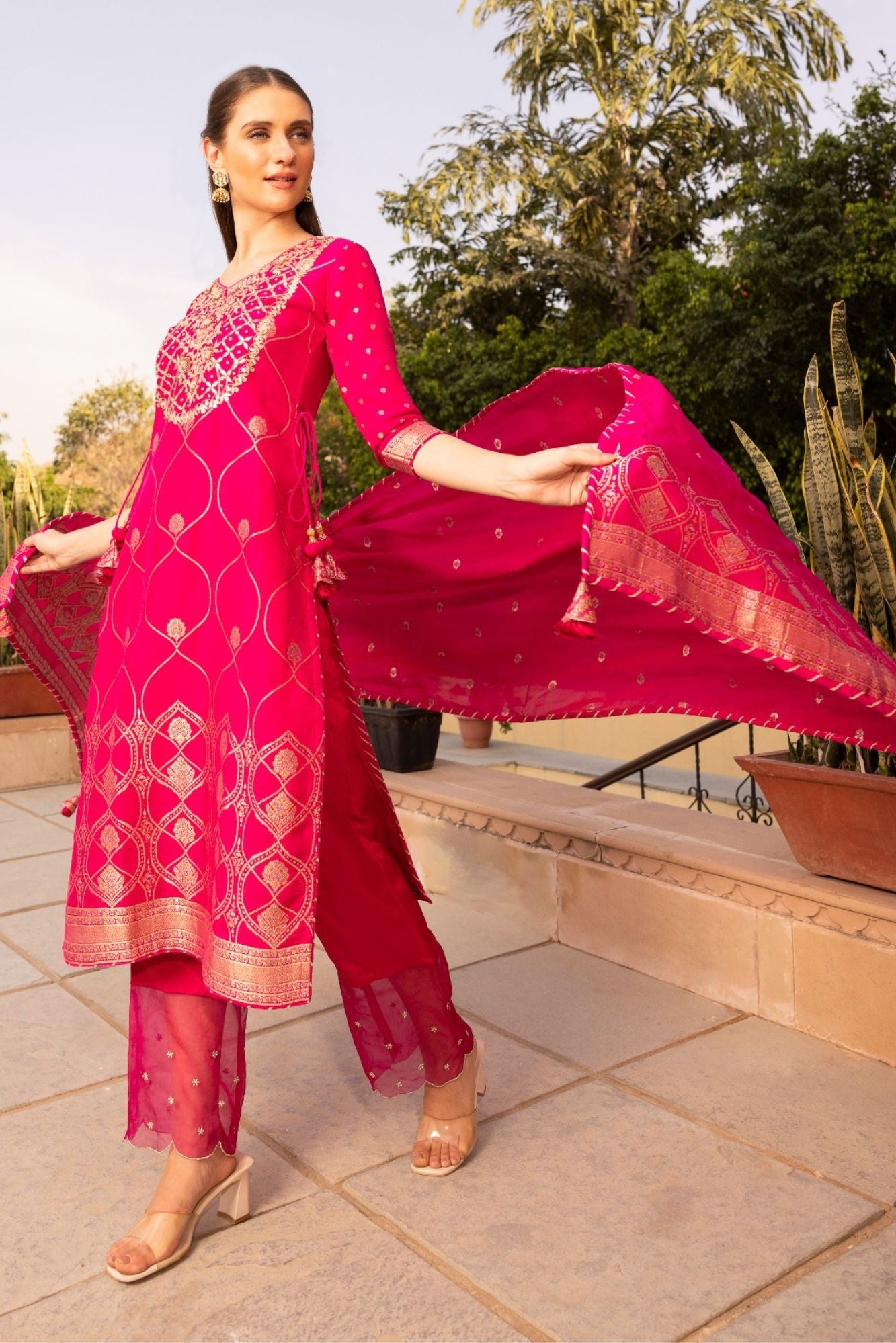 Handloom Dola Silk Suit Stitched with Gota Patti work.