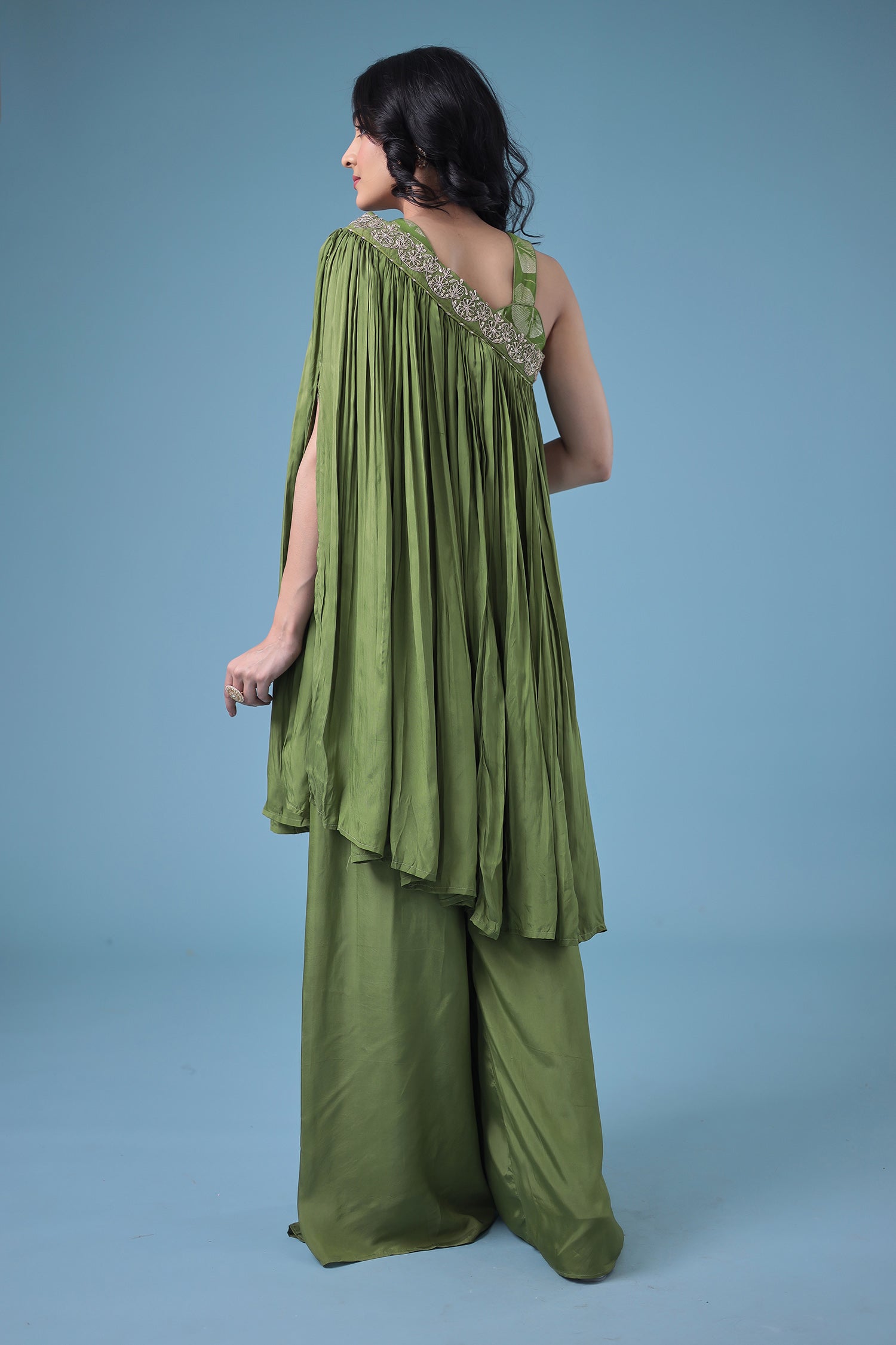 Exquisite Crop Top with Palazzo and a Draping Skirt Embellished with Zari and Dori work