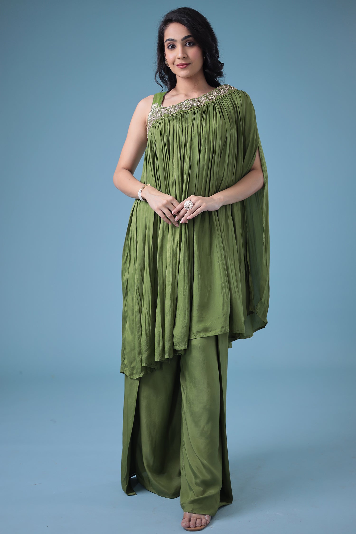 Exquisite Crop Top with Palazzo and a Draping Skirt Embellished with Zari and Dori work