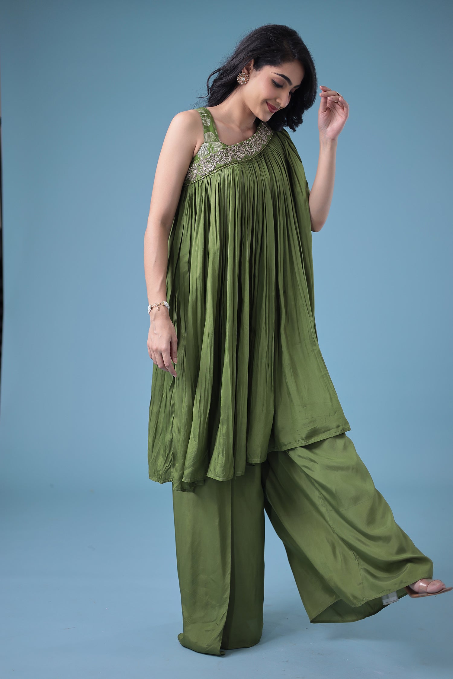 Exquisite Crop Top with Palazzo and a Draping Skirt Embellished with Zari and Dori work