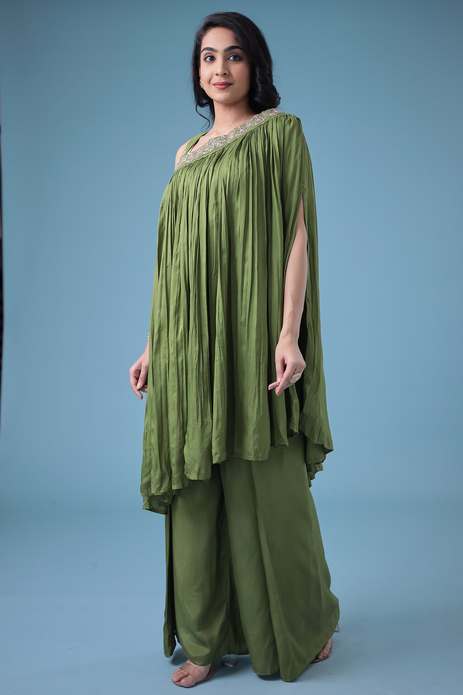 Exquisite Crop Top with Palazzo and a Draping Skirt Embellished with Zari and Dori work