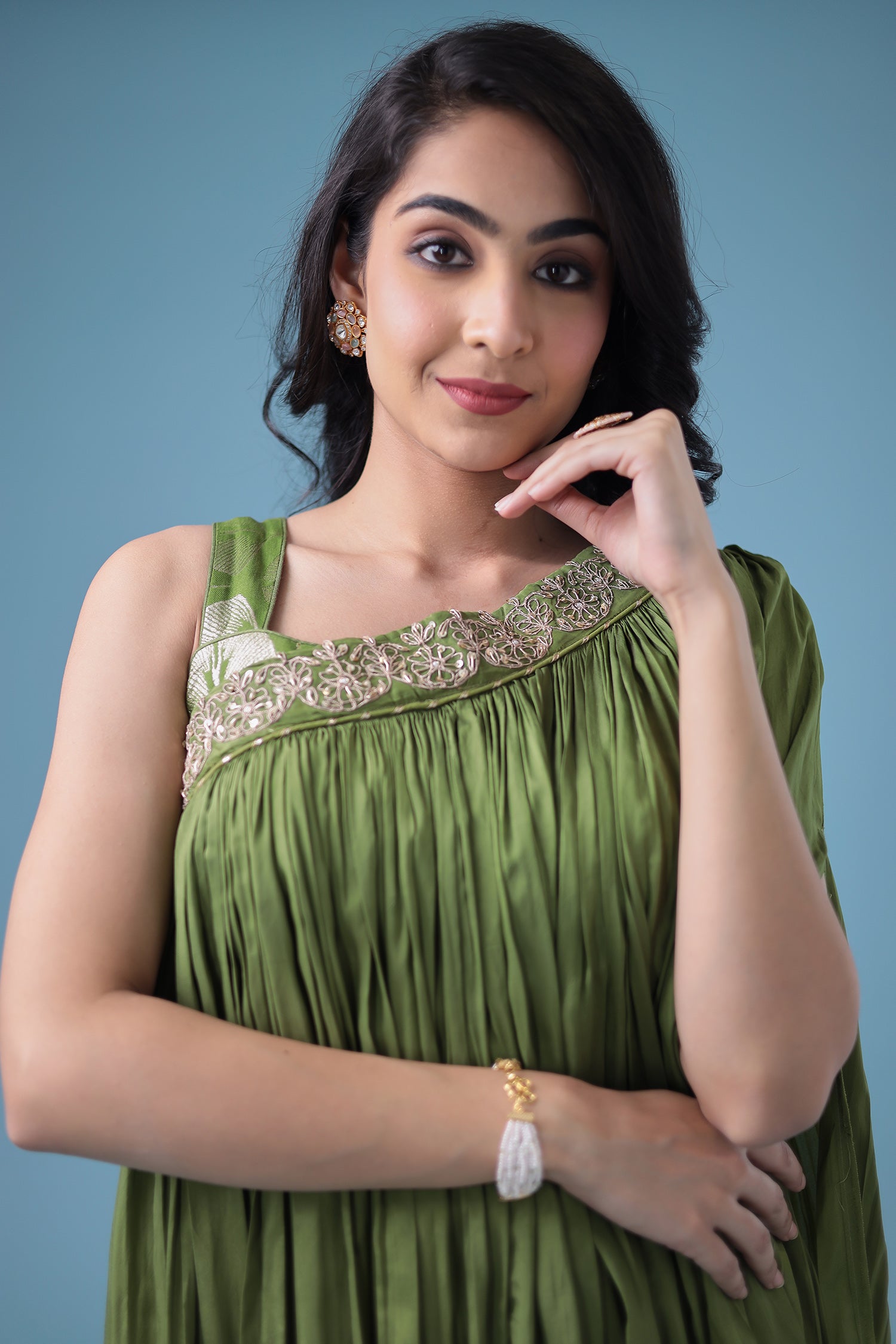 Exquisite Crop Top with Palazzo and a Draping Skirt Embellished with Zari and Dori work