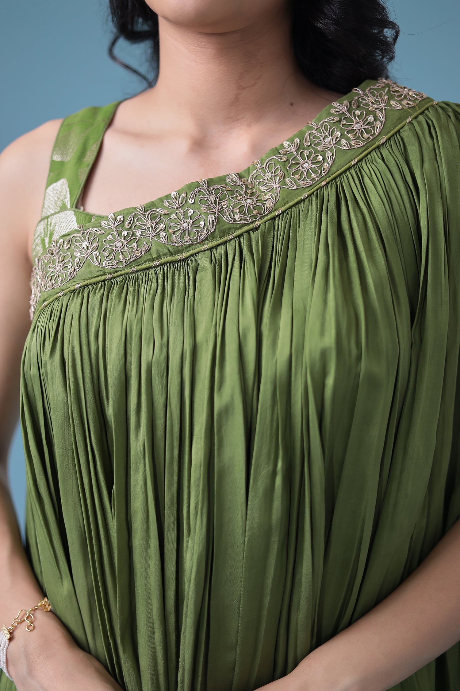 Exquisite Crop Top with Palazzo and a Draping Skirt Embellished with Zari and Dori work