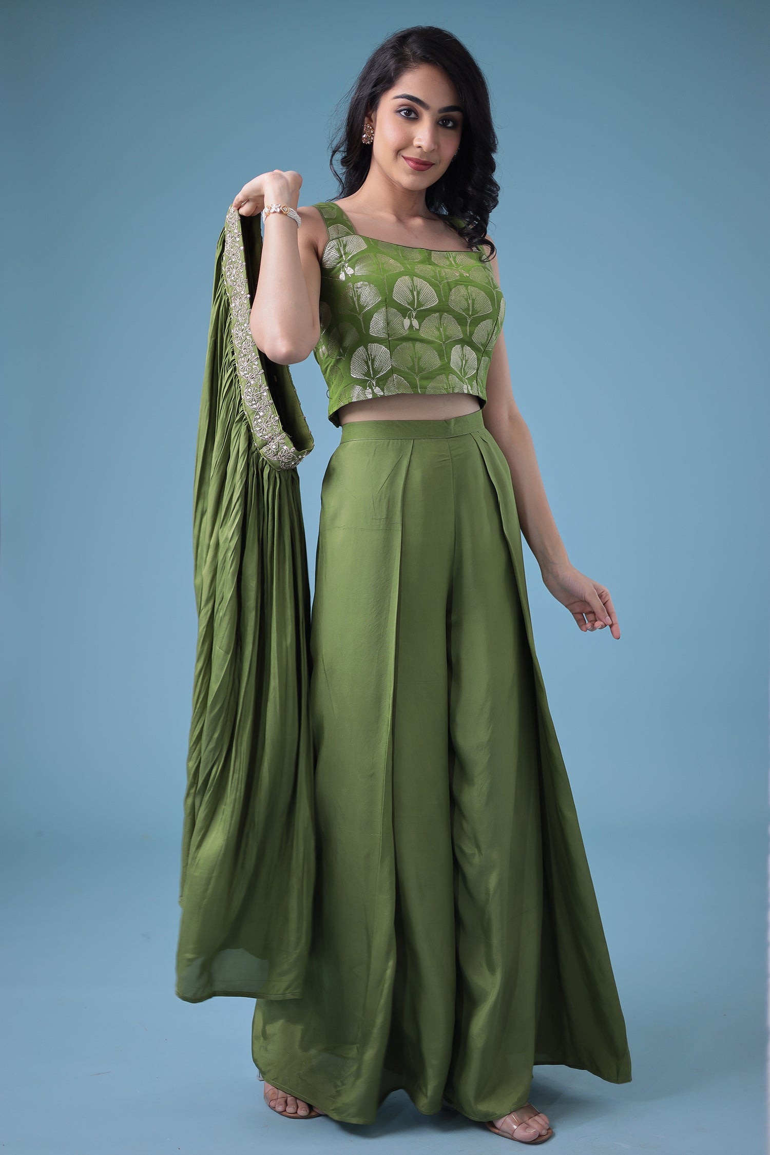 Exquisite Crop Top with Palazzo and a Draping Skirt Embellished with Zari and Dori work